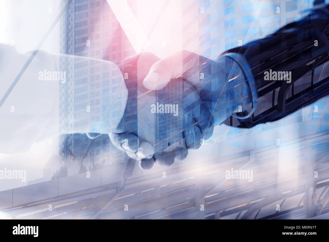Business man is holding hands with the building background Stock Photo ...