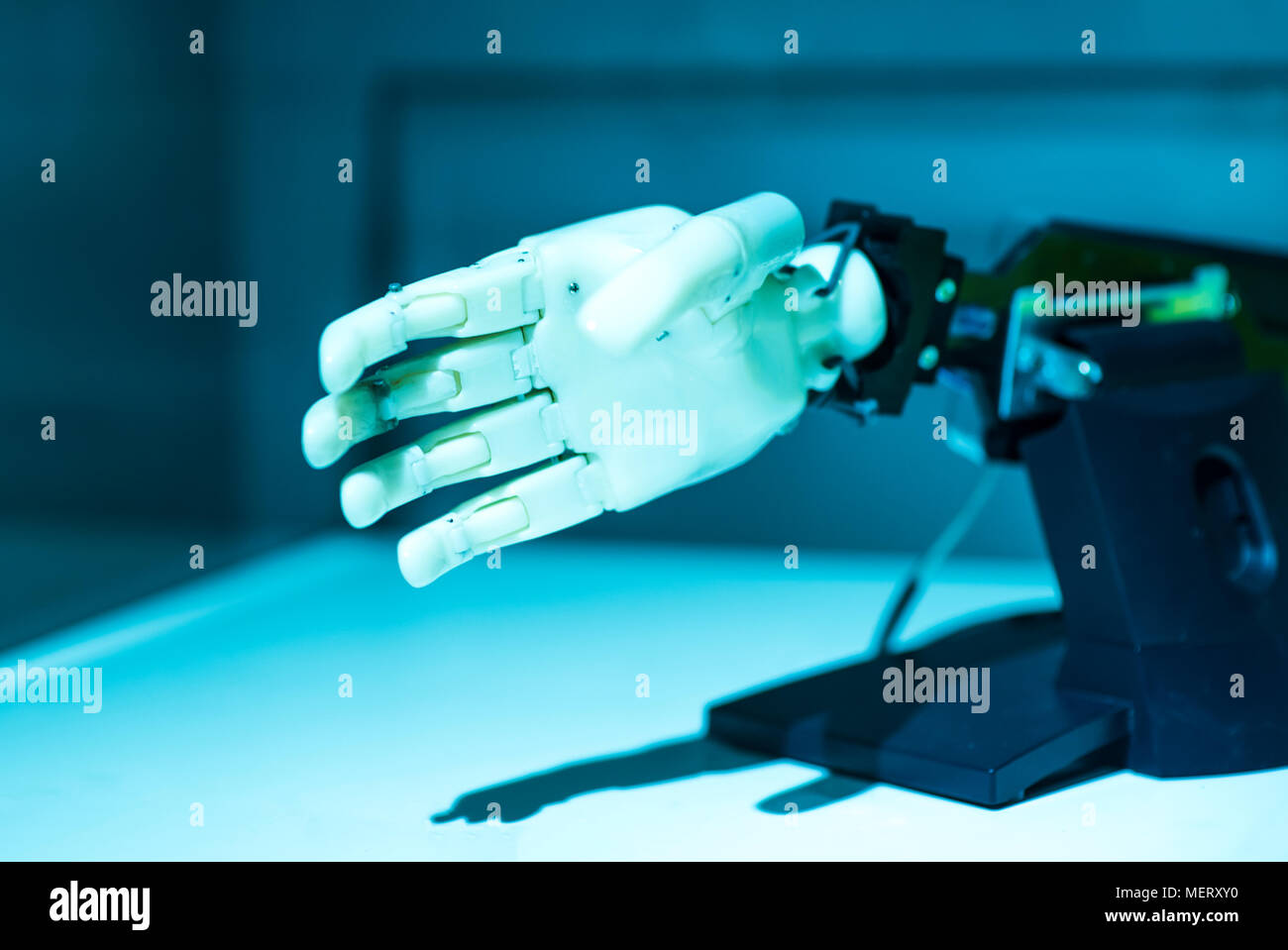 Augmented reality for industry concept. Robotic and Automation system control application on automate robot arm in smart manufacturing background. Stock Photo