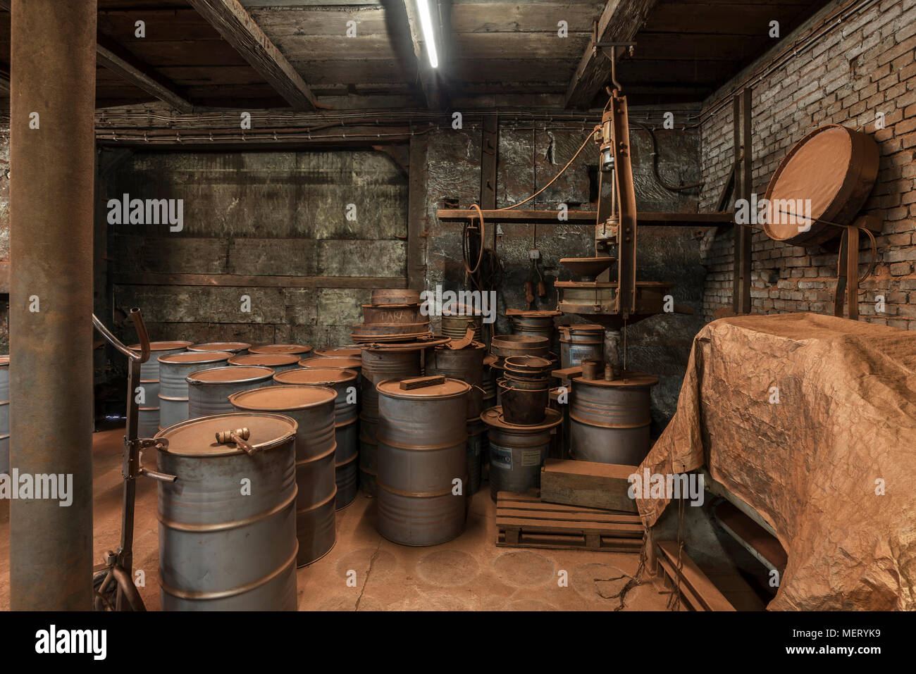 Production room for bronze powder with barrels and machines in a metal powder plant, founded around 1900, Upper Franconia Stock Photo
