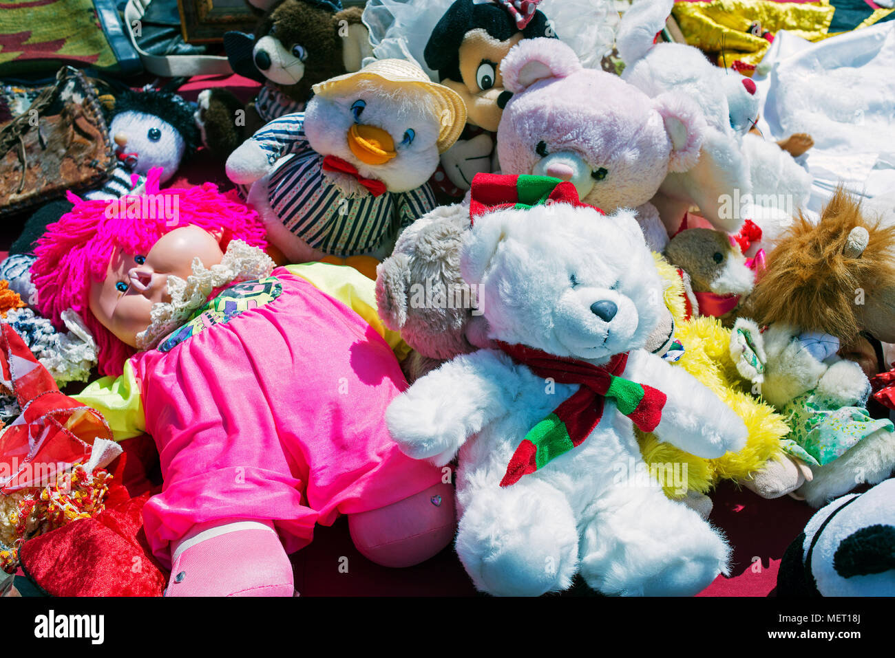 Teddy bears, barbie dolls, toys for kids in a flea market Stock Photo -  Alamy