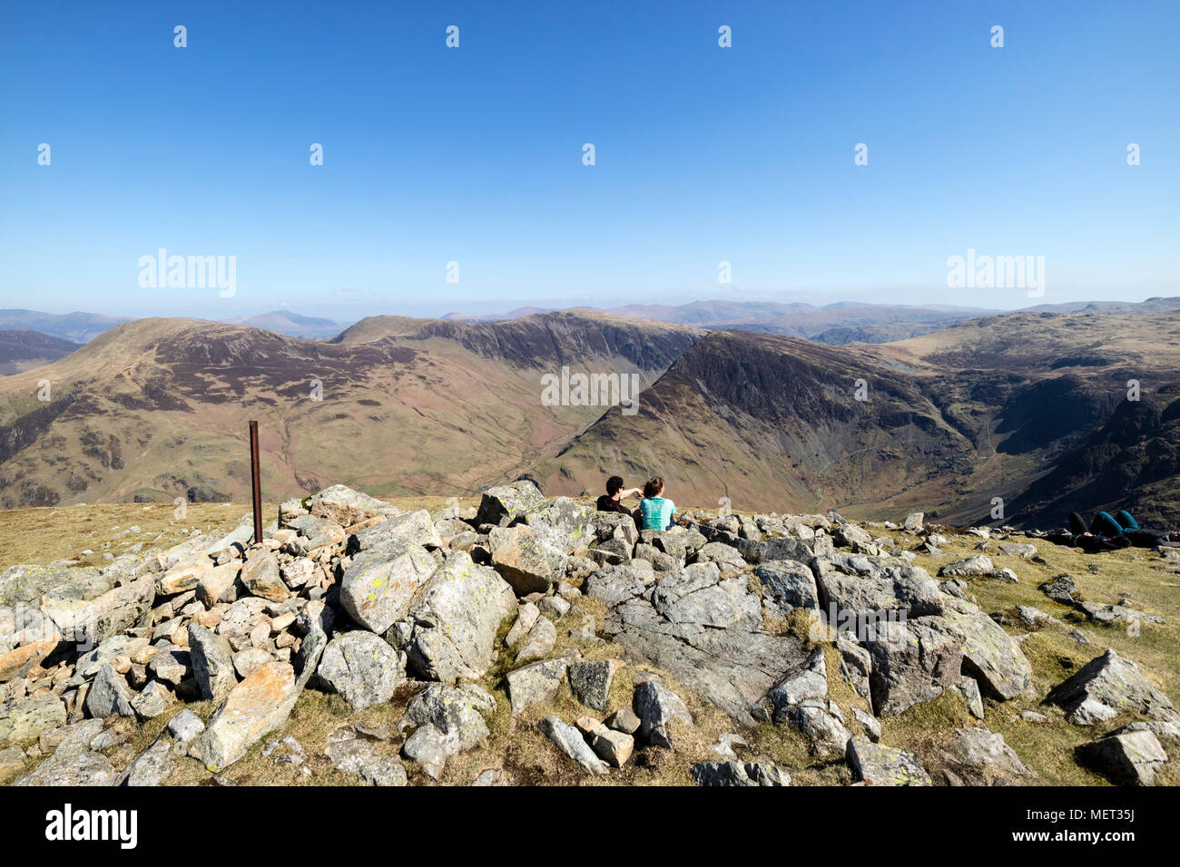 The Summit of High Crag with The View Towards Robinson, Hindscarth, Fleetwith Pike and Dale Head on a Hot Sunny Day, Lake District, Cumbria, UK Stock Photo