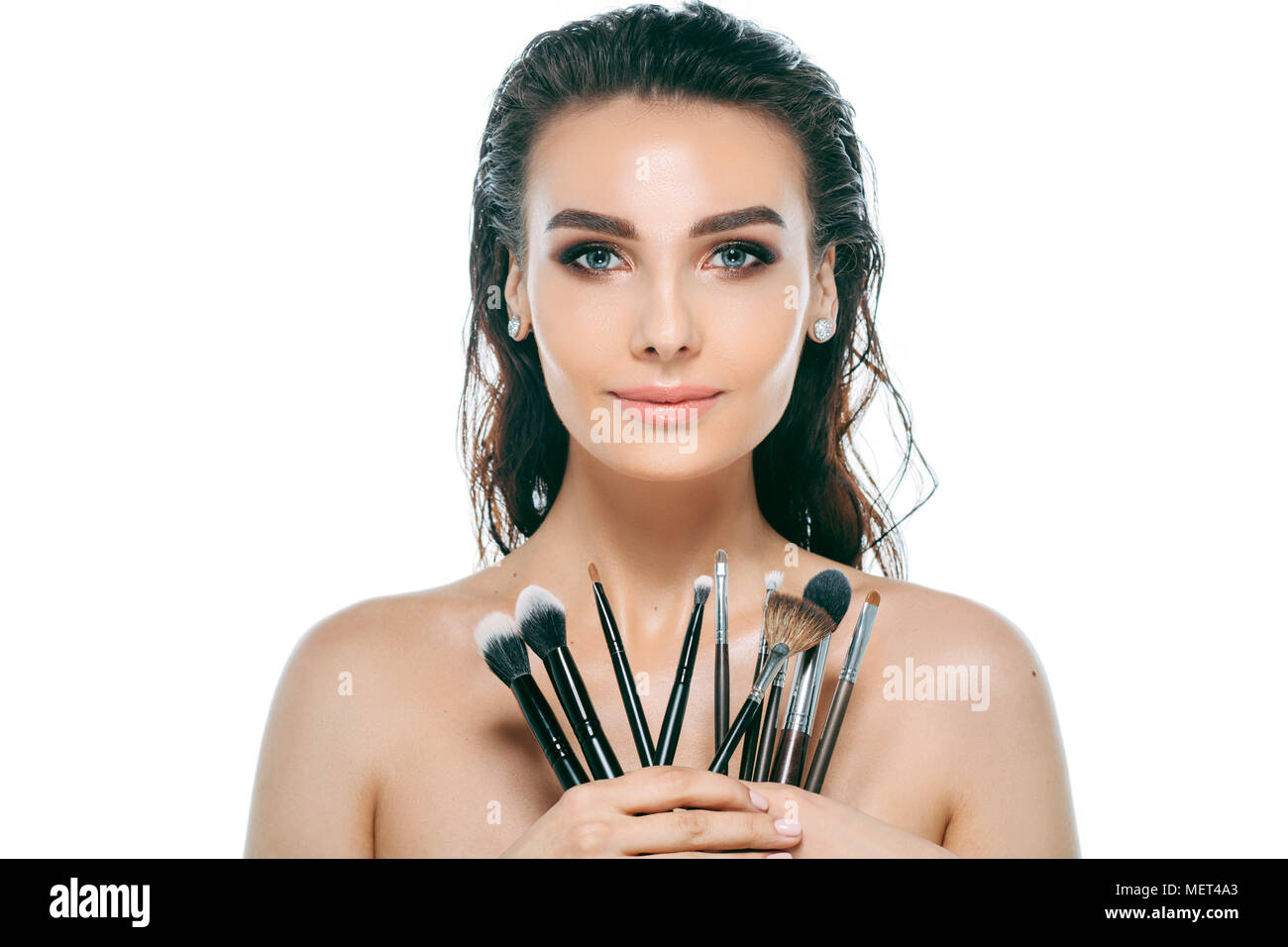 beauty woman face with makeup brushes Stock Photo Alamy