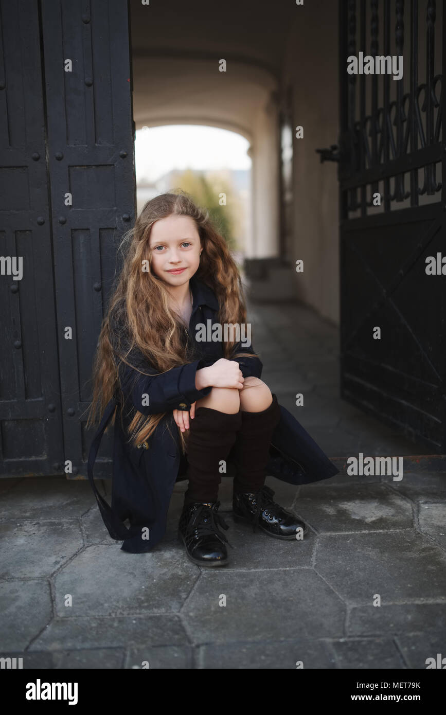 portrait of young girl in black coat Stock Photo - Alamy
