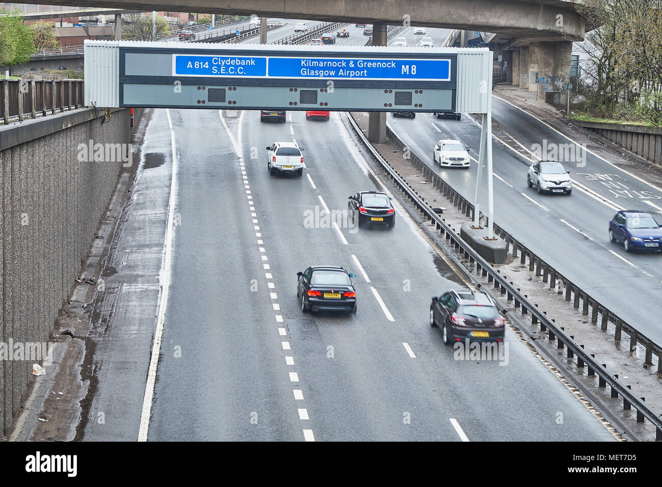 UK motorway signs on overhead gantry - junction 17 of the M8 Glasgow Scotland Stock Photo