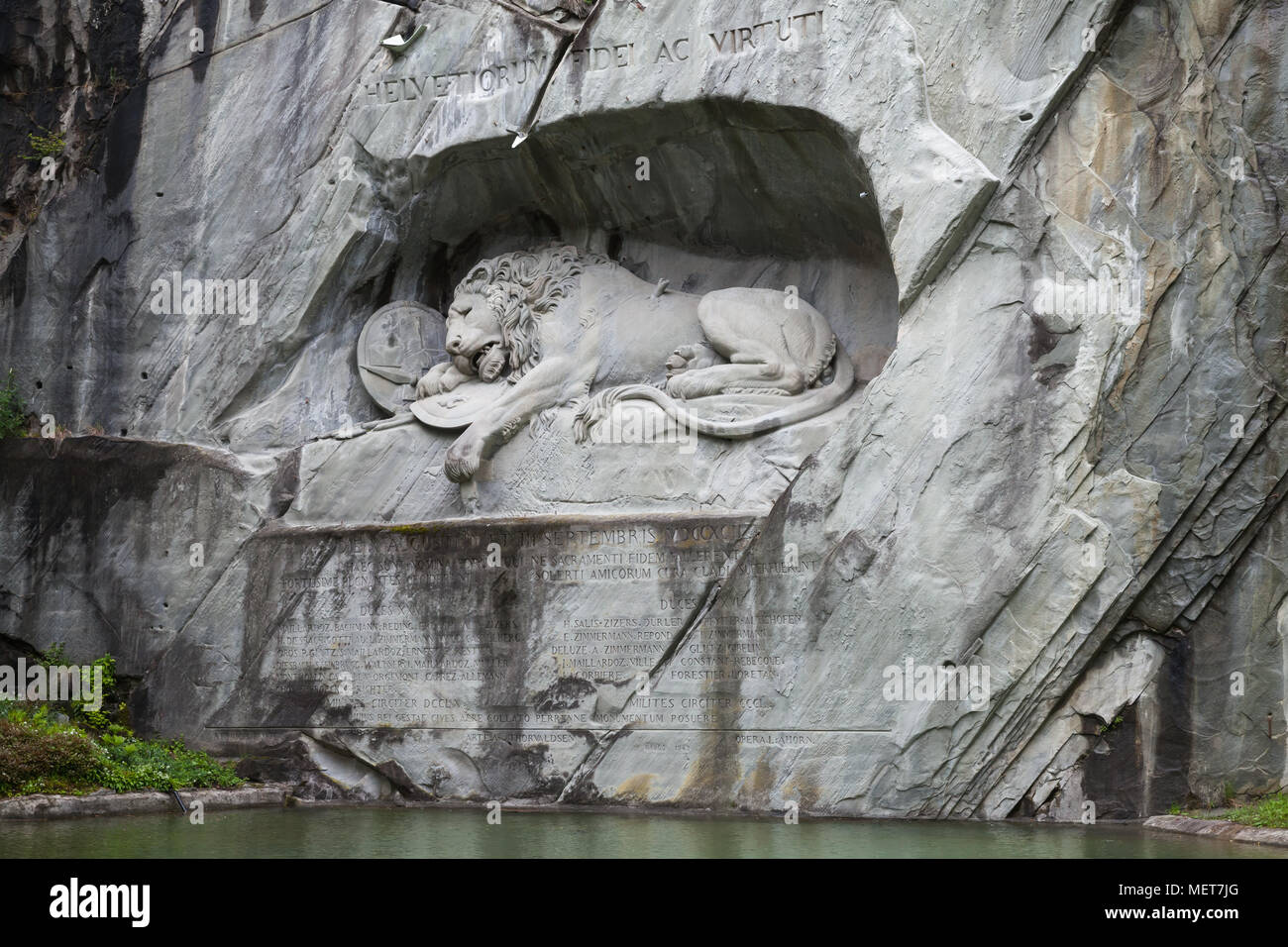 Lucerne, Switzerland - May 7, 2017: Lion Monument, a rock relief in Lucerne, Switzerland, designed by Bertel Thorvaldsen and hewn in 1820–1821 by Luka Stock Photo