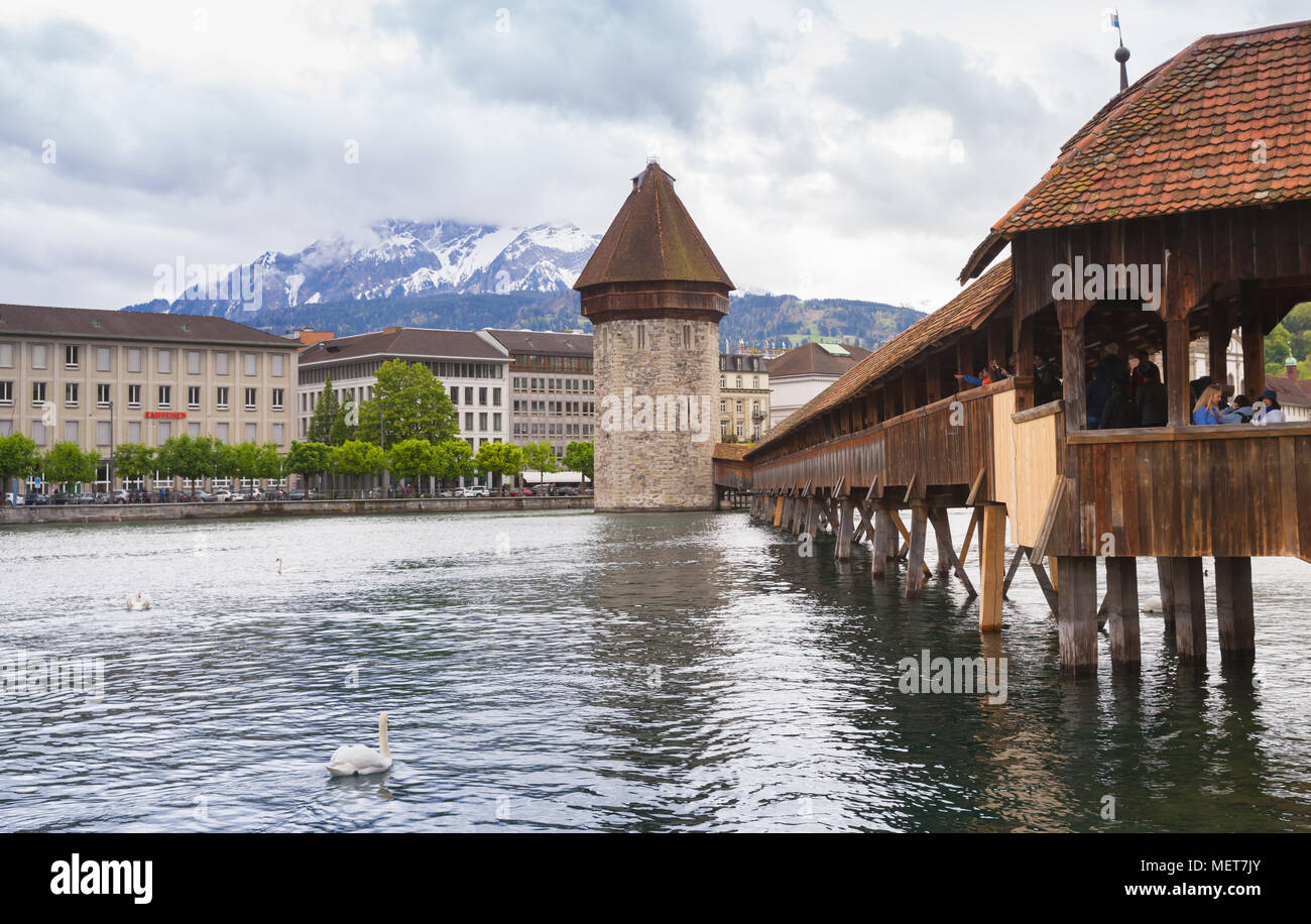 Lucerne, Switzerland - May 7, 2017: Chapel Bridge and Water Tower, a fortification from the 13th century Stock Photo