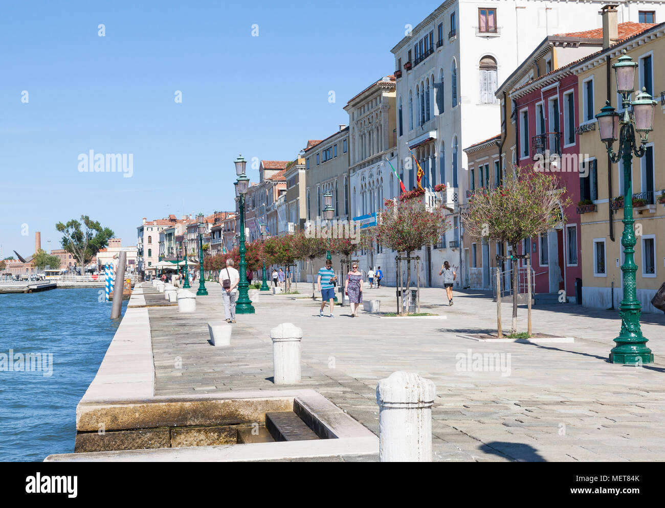 The Zattere, Dorsoduro, Venice, Veneto, Italy in summer  with people walking along the waterfront promenade Stock Photo