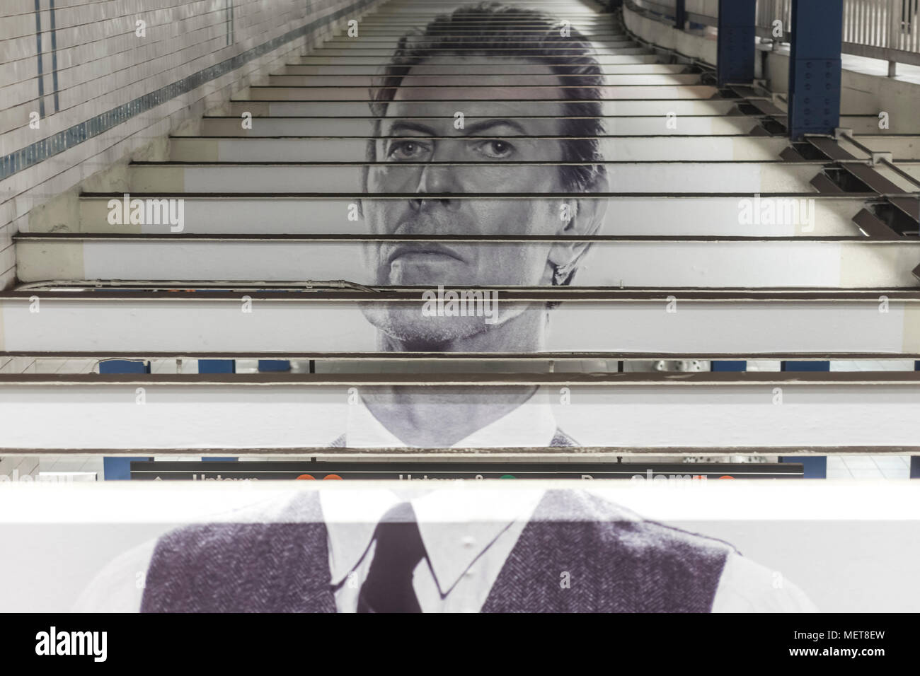 New York, USA. 121 April, 2018. Image of David Bowie across the beams of the the Broadway-Lafayette subway station.  The installation, sponsorsed  by Spotify, is being held in conjunction with the exhibition 'David Bowie IS' at the Brooklyn. The subway installation is just blocks from where the late rock star lived in Soho. The art will be on display until mid May. ©Stacy Walsh Rosenstock Stock Photo