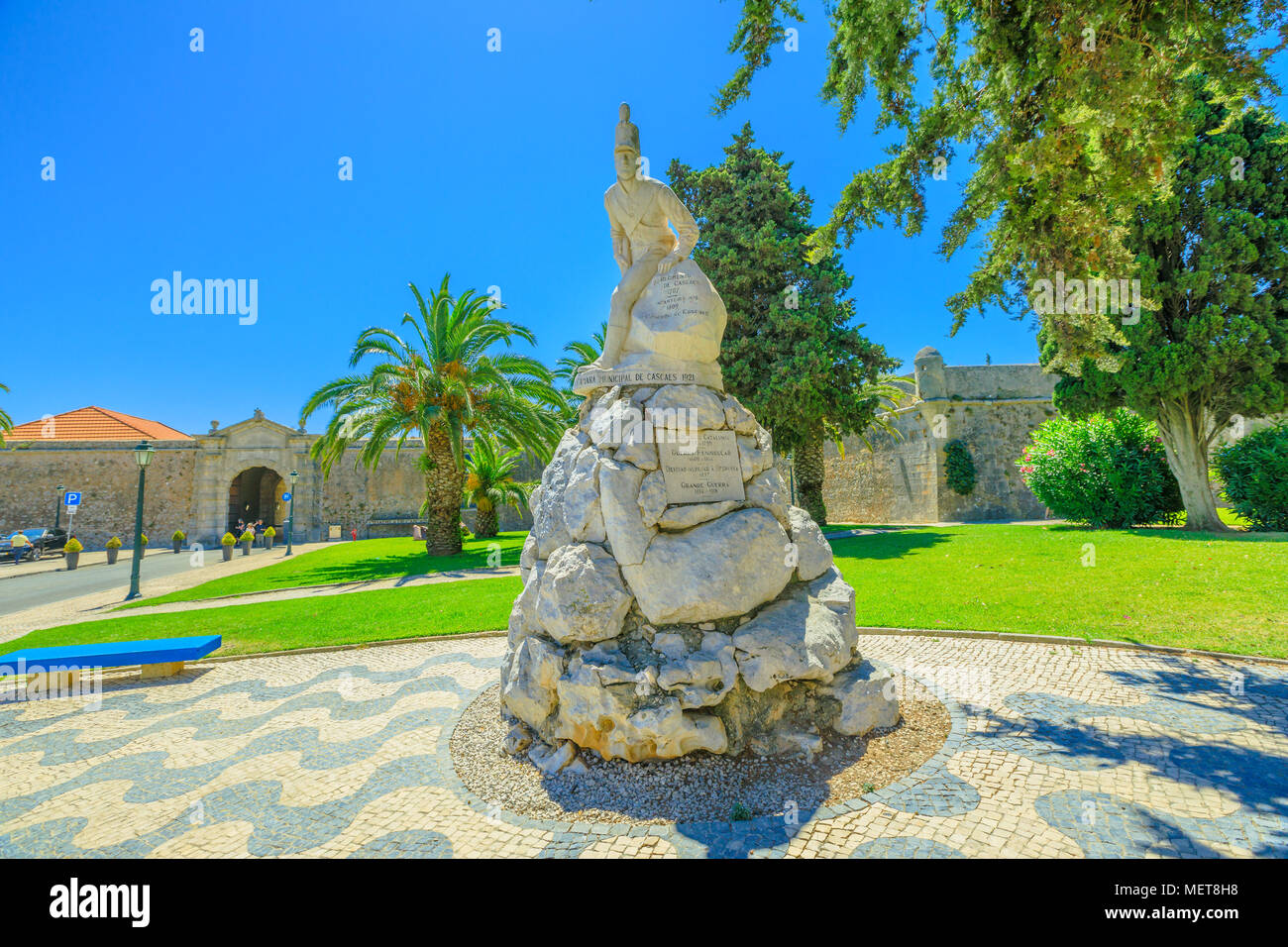 Cascais, Portugal - August 6, 2017: Monument Infantry Regiment or statue of Peninsular war against Cascais fortress Our Lady of Light in Cascais the most popular holiday destination on Lisbon coast. Stock Photo
