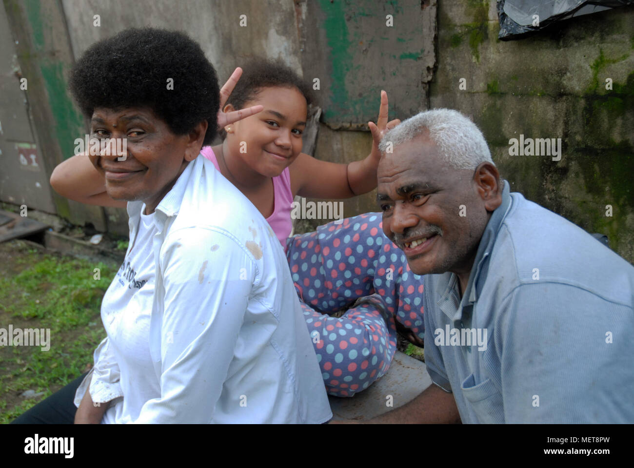 Grandparents with their granddaughter, Suva, Fiji Stock Photo