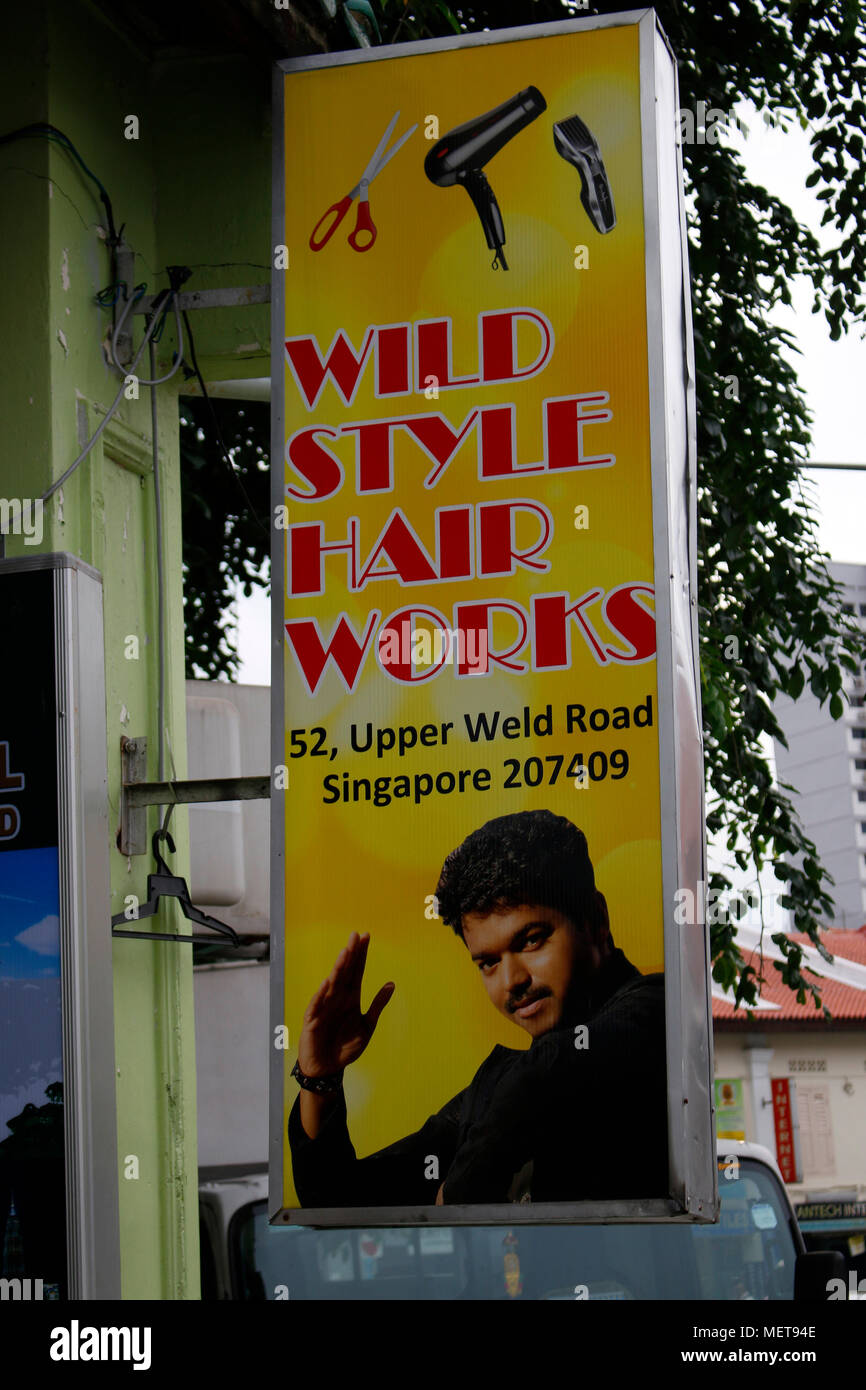 Werbung fuer Friseur: 'Wild Style Hair Works', Singapur. Stock Photo