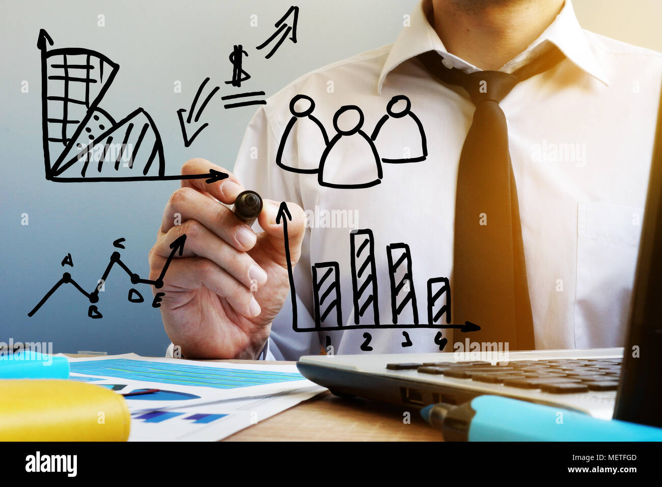Business management. Workplace of manager and financial charts and graphs. Stock Photo