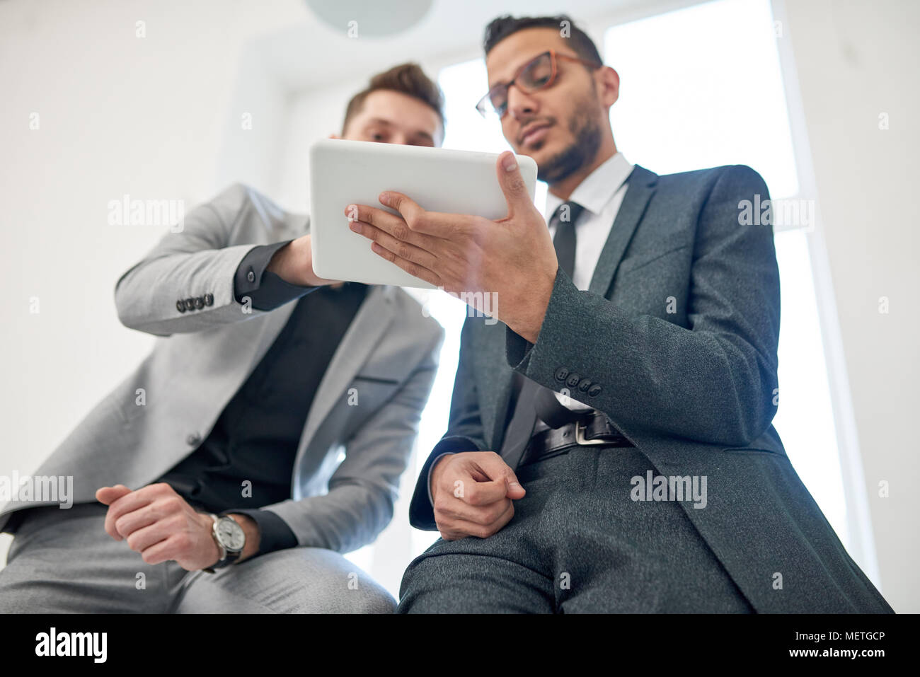 Multi-Ethnic Team Wrapped up in Work Stock Photo
