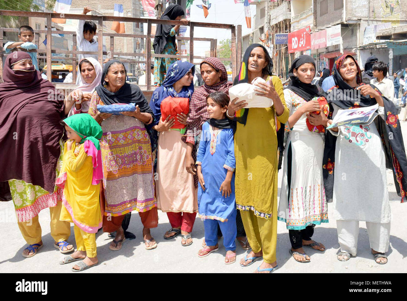 Residents of Miro Khan are holding protest demonstration against high handedness of Police Department, at Jinnah Bagh roundabout in Larkana on Sunday, April 22, 2018. Stock Photo