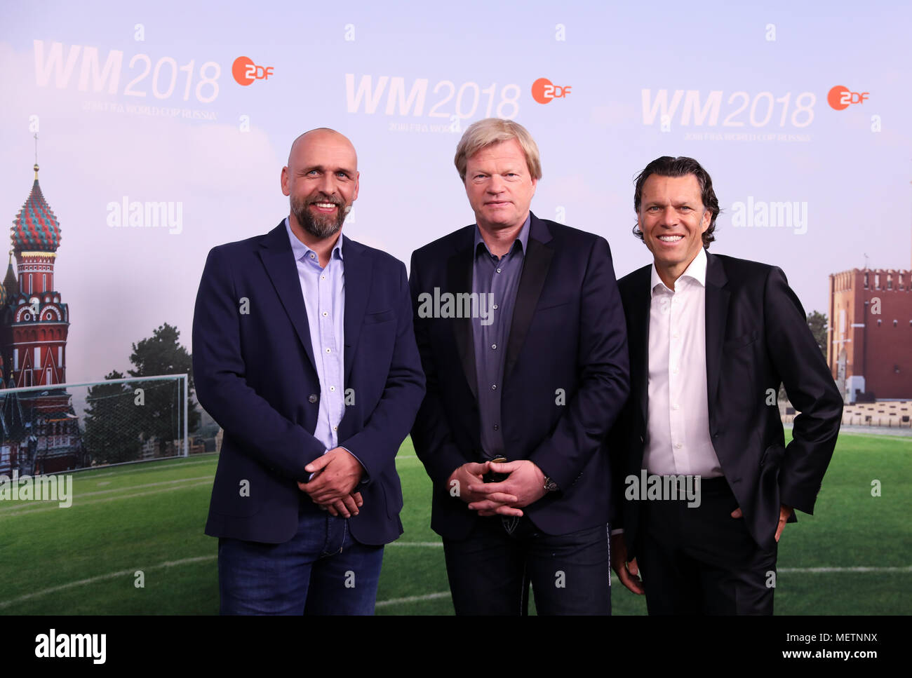 23 April 2018, Germany, Hamburg: Holger Stanislawski (L-R), Oliver Kahn and Urs Meier, ZDF presenters for the soccer World Cup 2018 in Russia, during a photocall prior to a press conference of the German TV channels ARD and ZDF on the World Cup in Russia. Photo: Christian Charisius/dpa Stock Photo