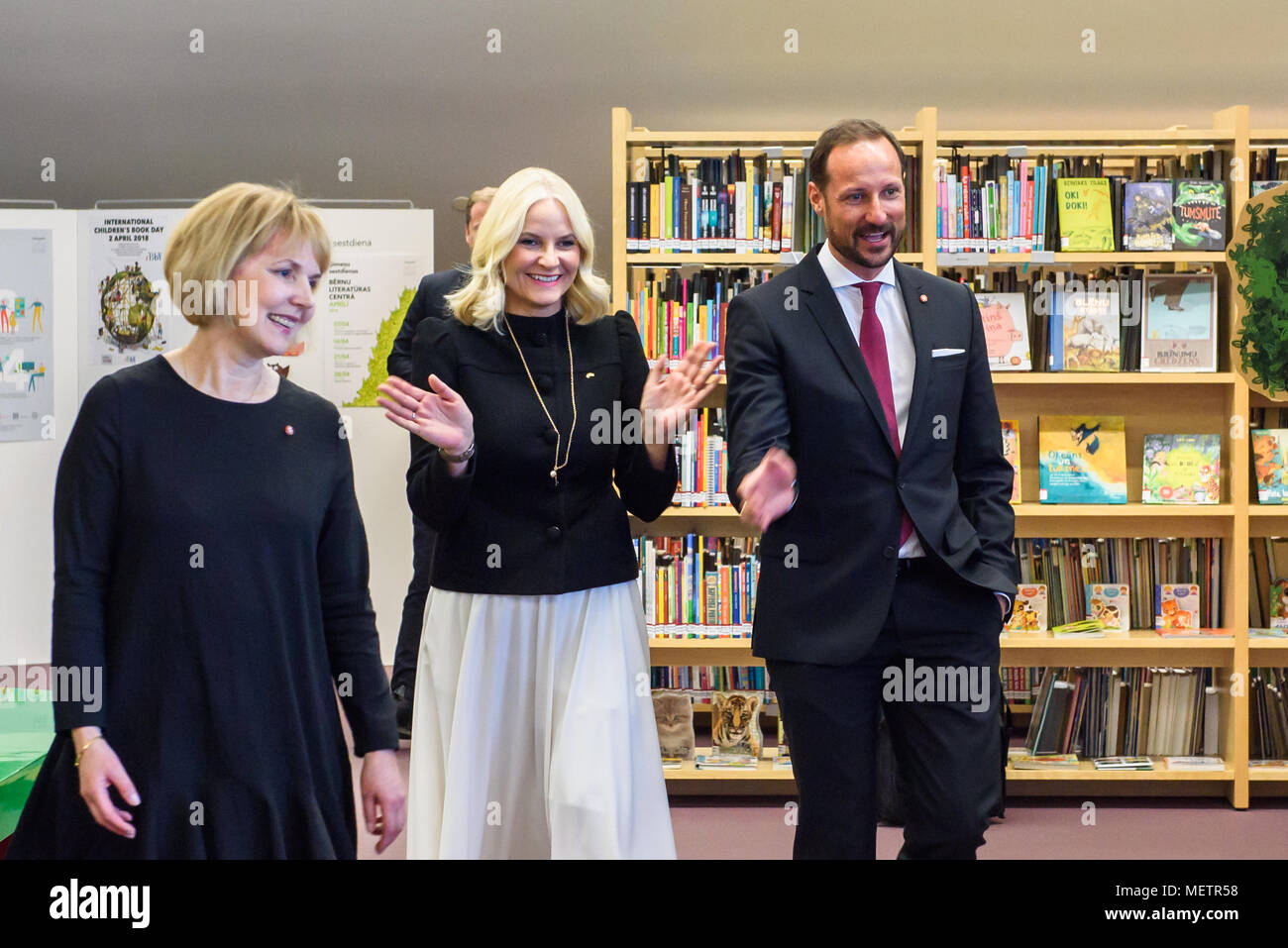 Riga, Latvia. 23rd April, 2018. Crown Prince Haakon , Crown Princess Mette-Marit of the Kingdom of Norway meeting with children in National Library of Latvia. Credit: Gints Ivuskans/Alamy Live News Stock Photo