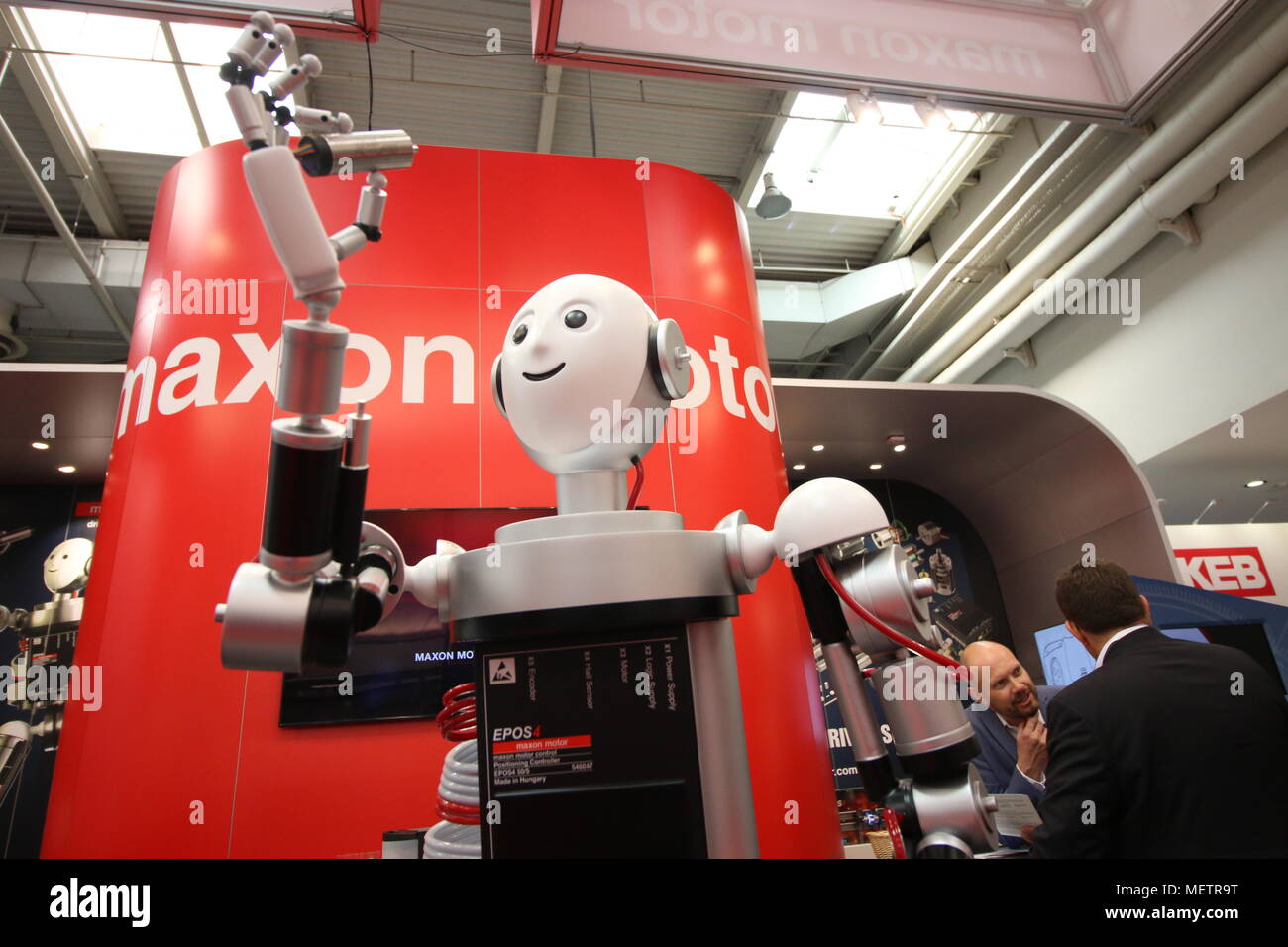 Hannover, Germany - April 23, 2018: A robot entertains visitors in Hannover. At this year's Hannover Fair, the world's largest industrial trade fair, everything revolves around digitisation 4.0, robots and self-learning systems. Stock Photo