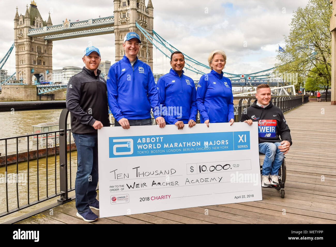 London, UK. 23rd April, 2018. David Weir (GBR) with the VMLM officials at Winners presentation after the 2018 Virgin Money London Marathon on Monday, 23 April 2018. London, England. Credit: Taka Wu/Alamy Live News Stock Photo