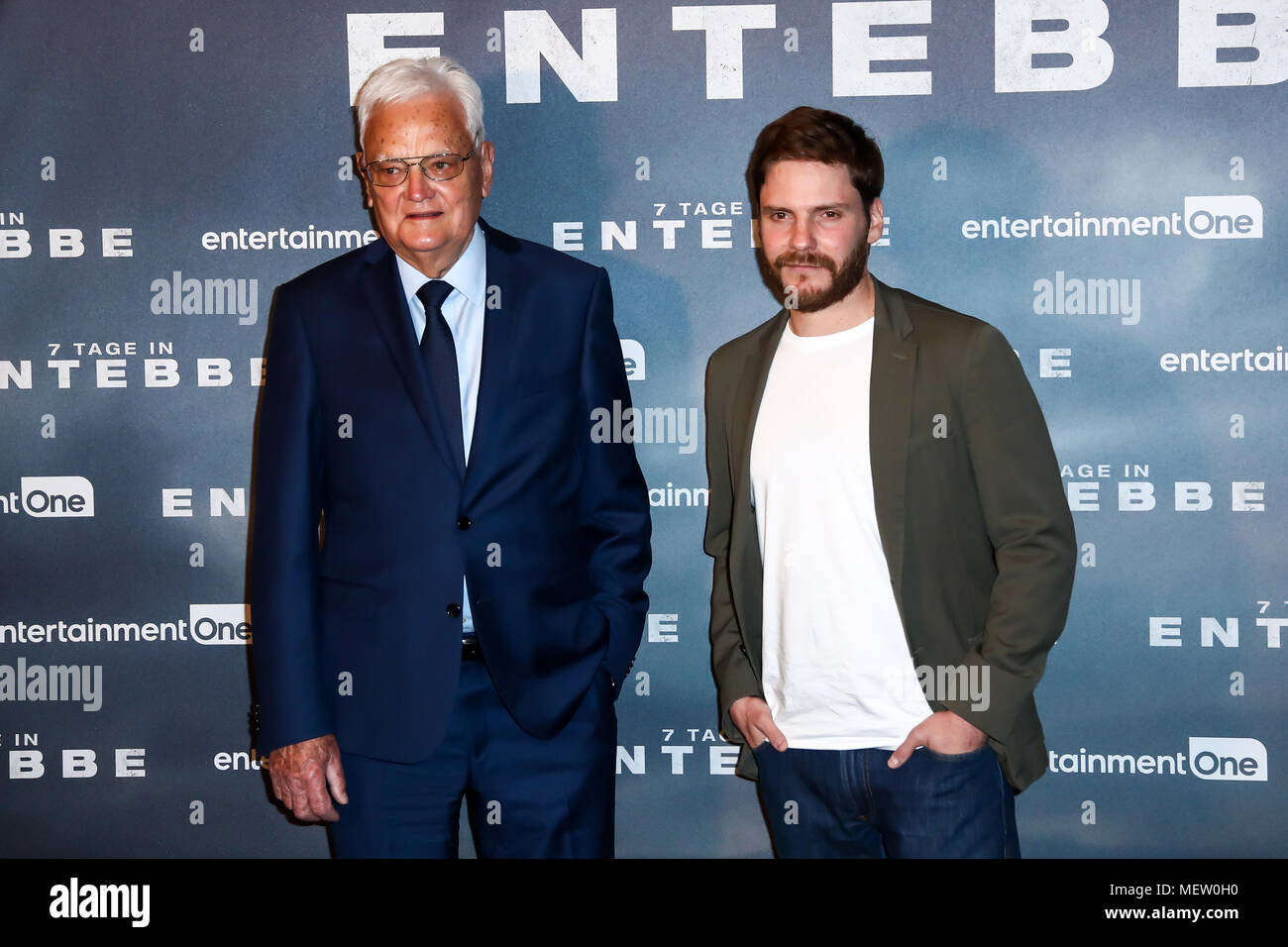 Berlin, Germany, 23.4.18, Daniel Bruehl (Actor, Plays Wilfried Boese) - Jacques Lemoine (Contemporary witness, flight engineer of the Air France machine) attend Photocall Entebbe ( German: 7 Tage in Entebbe ), Kino in der Kulturbrauerei Credit: Holger Much/Alamy Live News Stock Photo