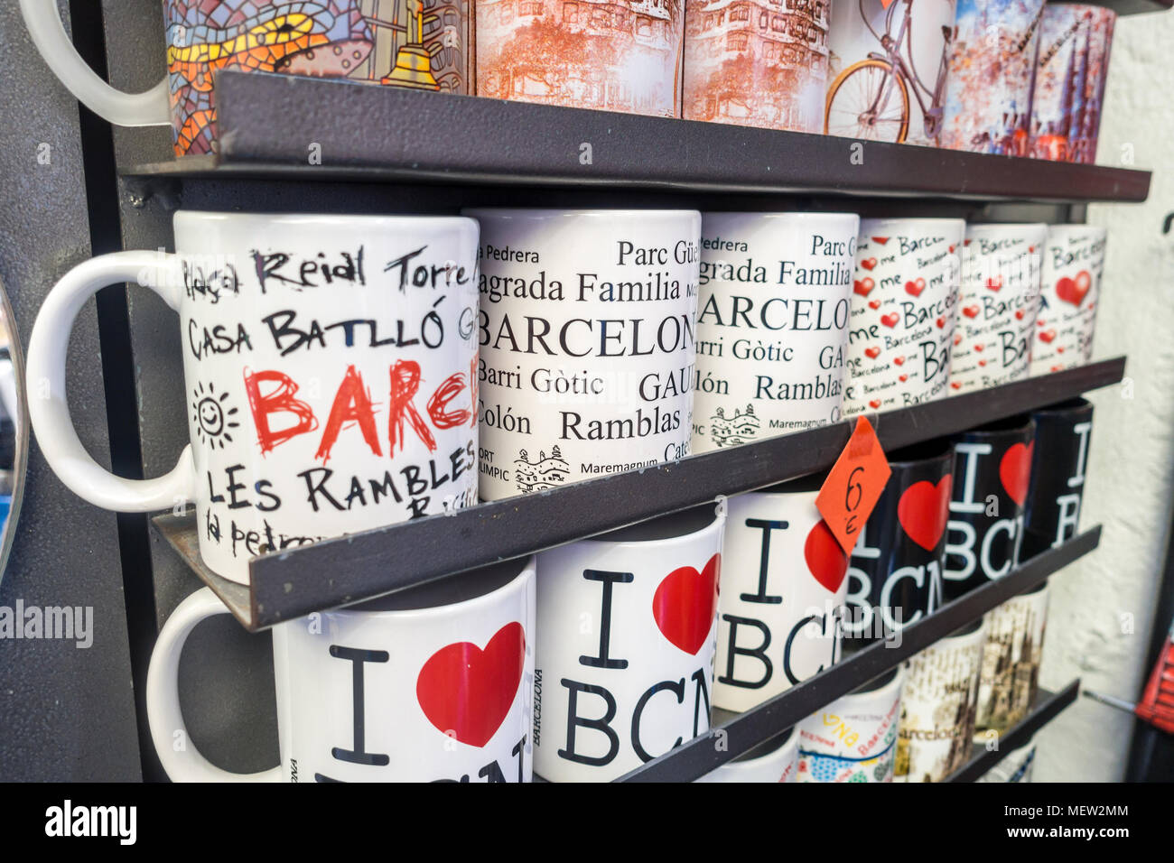 Mugs on sale in a souvenier shop in Barcelona. Stock Photo