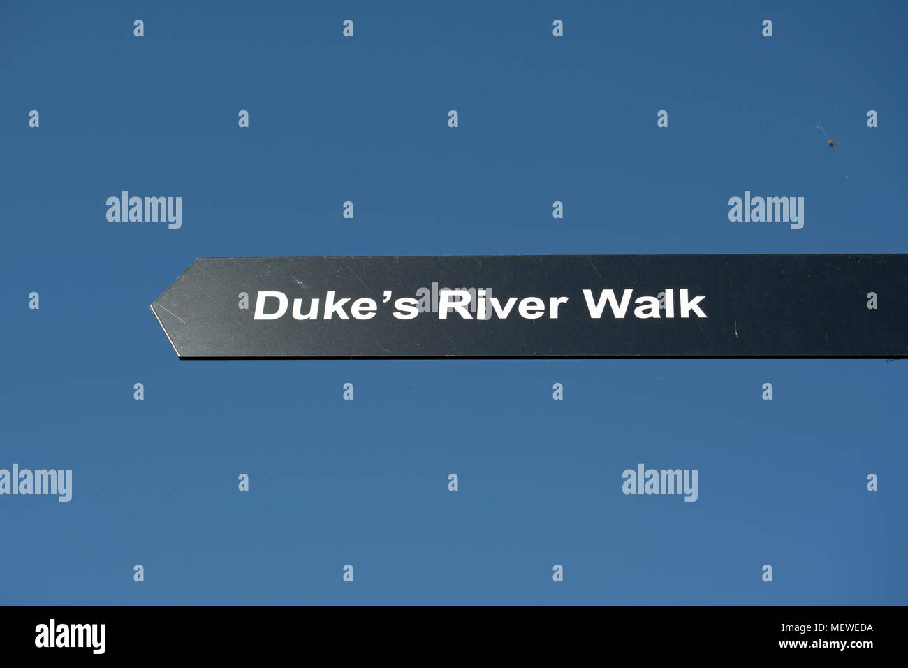 direction sign for the duke's river walk, alongside the duke of