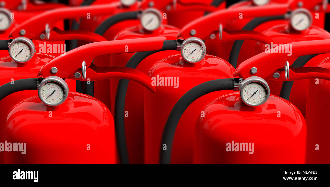 Fire safety. Group of red fire extinguishers, closeup view. blur