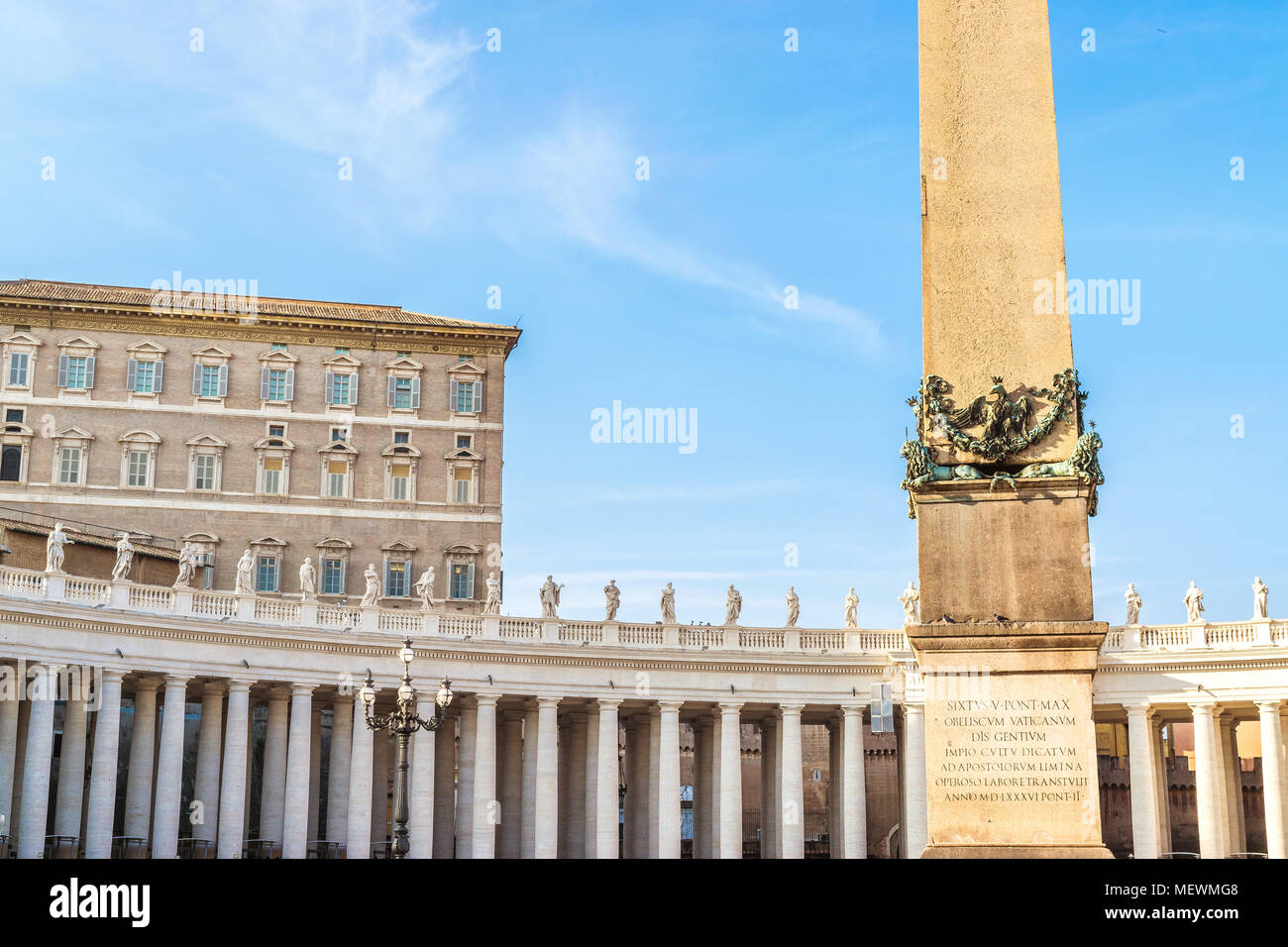 The apostolic palace and the window for the Pope's angelus above the colonnade of the Saint Peter's in the Vatican and the obelisk Stock Photo
