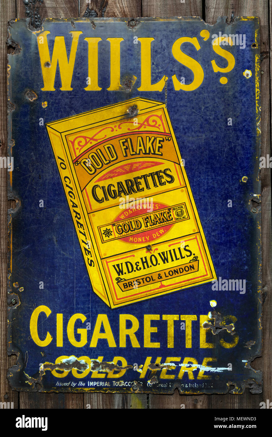 An old metal advetising sign for Gold Flake Cigarettes - England circa 1913. Stock Photo