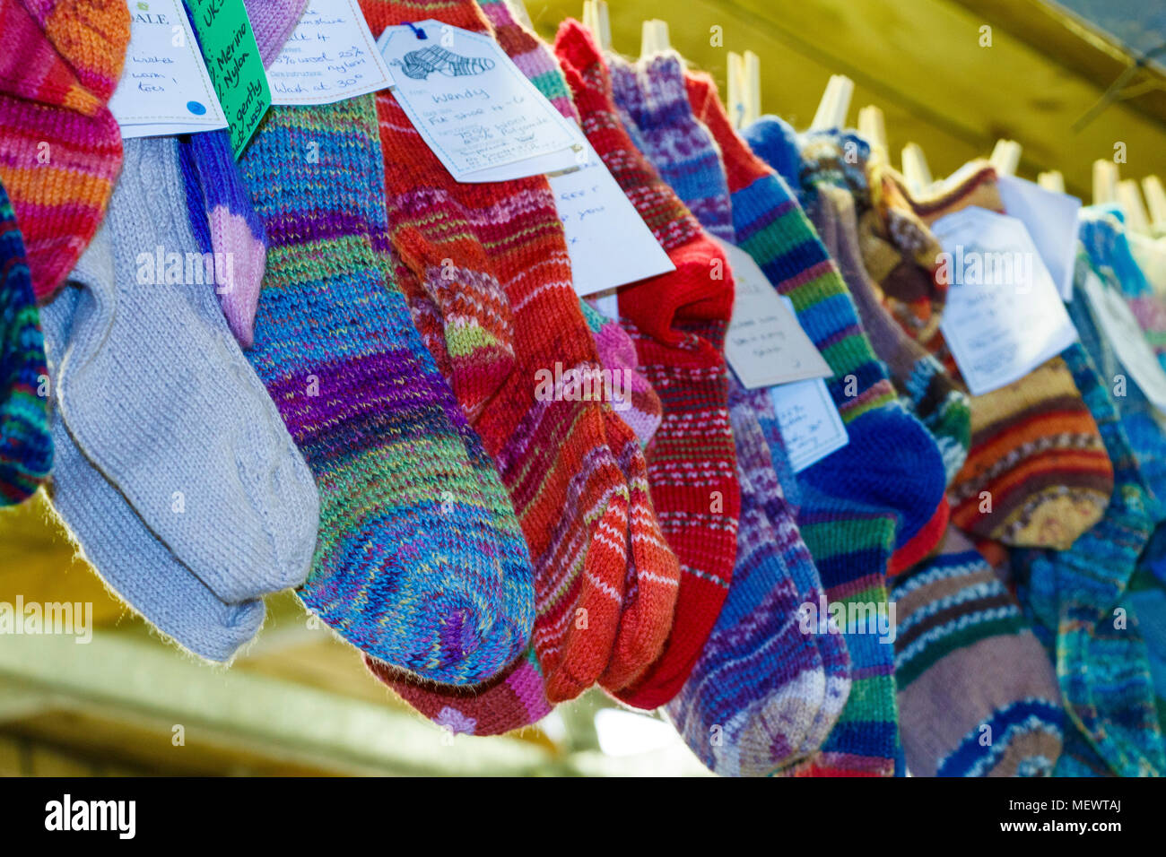 Part of the Winwick Mum Sock Line, donated by craft knitters to be passed on to those in need. Yarndale, Skipton, North Yorkshire, UK. Stock Photo
