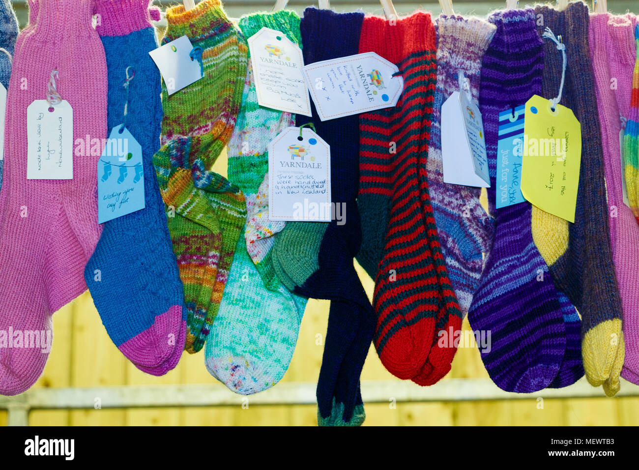Part of the Winwick Mum Sock Line, donated by craft knitters to be passed on to those in need. Yarndale, Skipton, North Yorkshire, UK. Stock Photo
