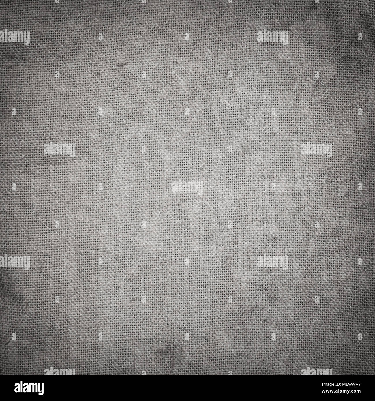Old stained grey square creasy burlap texture. Stock Photo