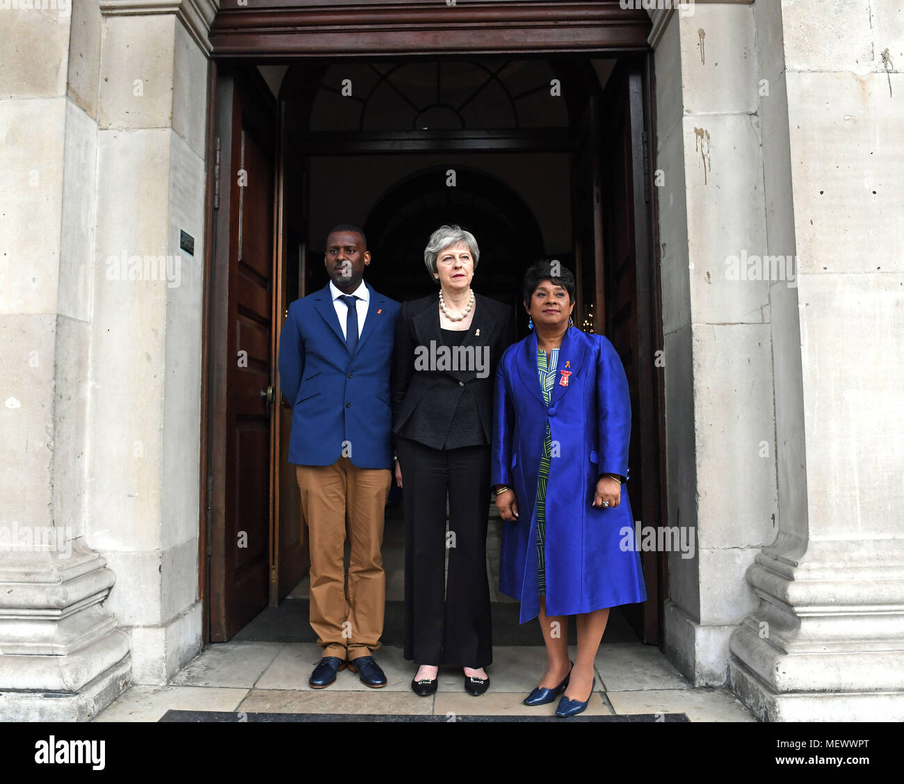 Baroness Lawrence (right) and her son Stuart with Prime Minister Theresa May before a memorial service at St Martin-in-the-Fields in Trafalgar Square, London, to commemorate the 25th anniversary of the murder of Stephen Lawrence. Stock Photo