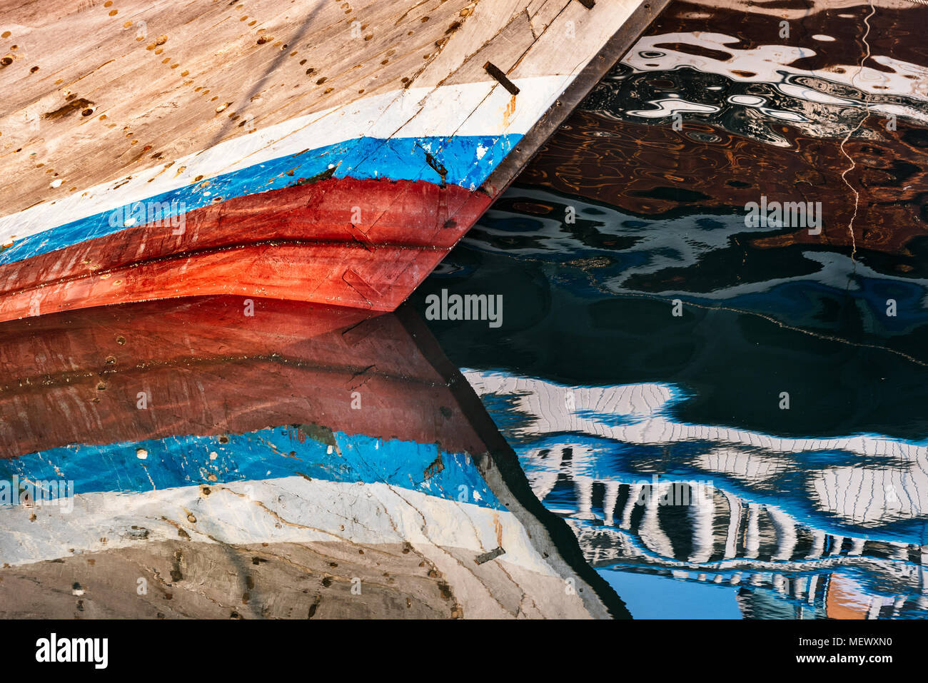 Boats  and its abstract reflection in water Stock Photo