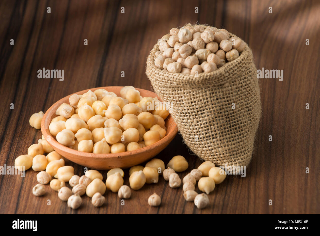 grains of chickpeas, (Cicer arietinum) in bowl on the table Stock Photo
