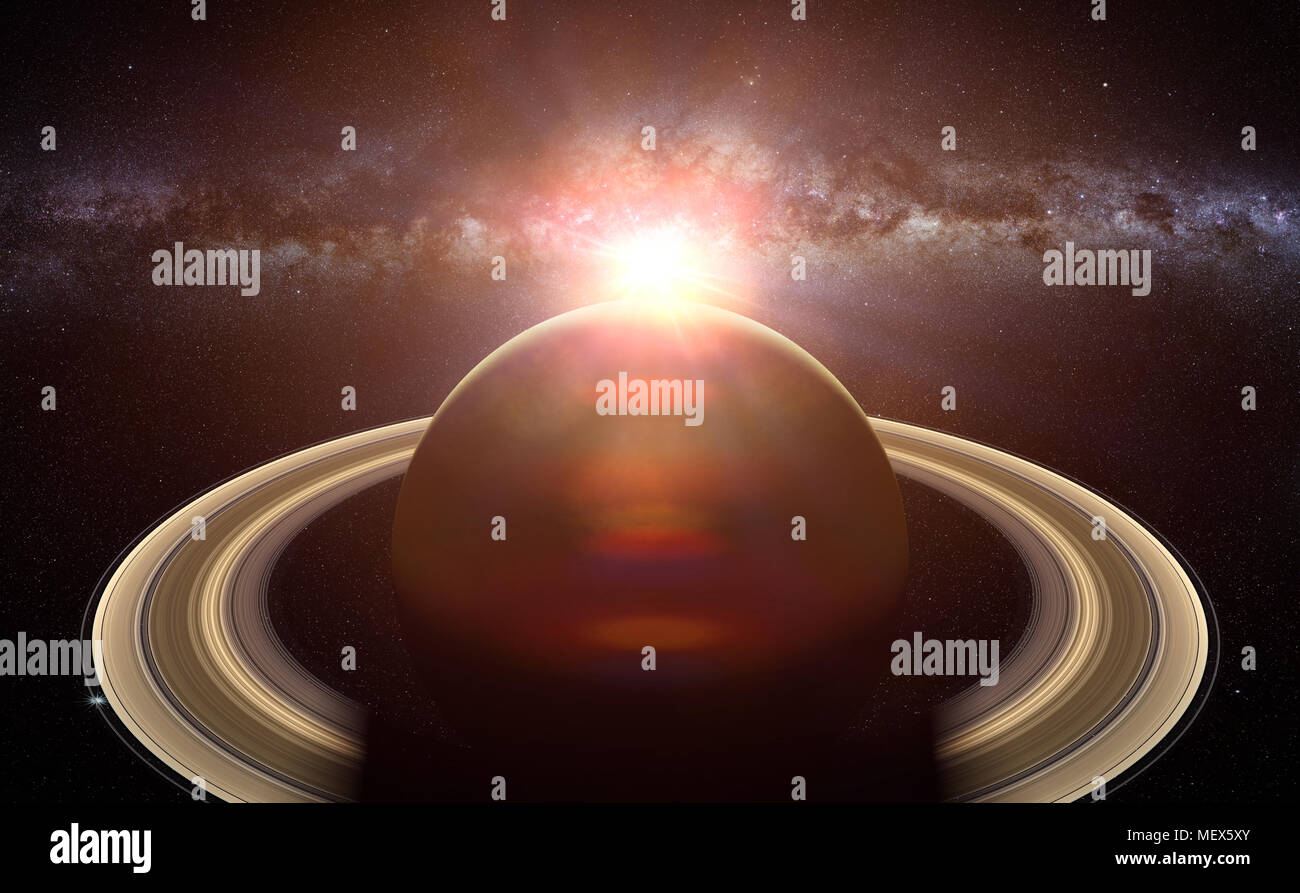 the planet Saturn with the Sun and the Milky Way galaxy Stock Photo