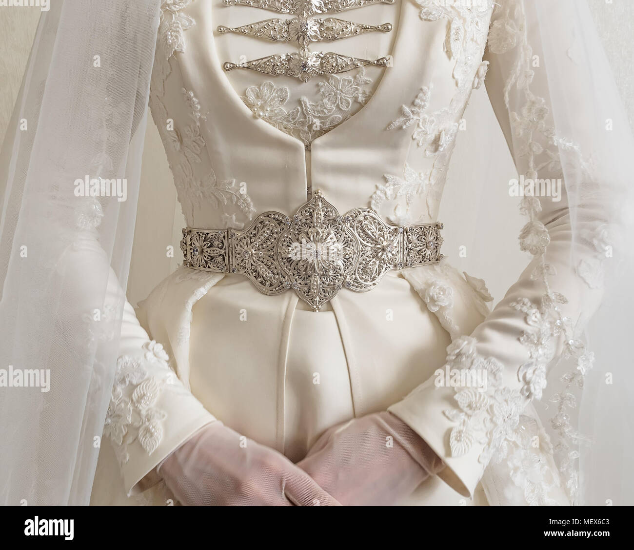 National costume of Caucasian bride. Close-up of a wedding dress. Wedding  gown background Stock Photo - Alamy