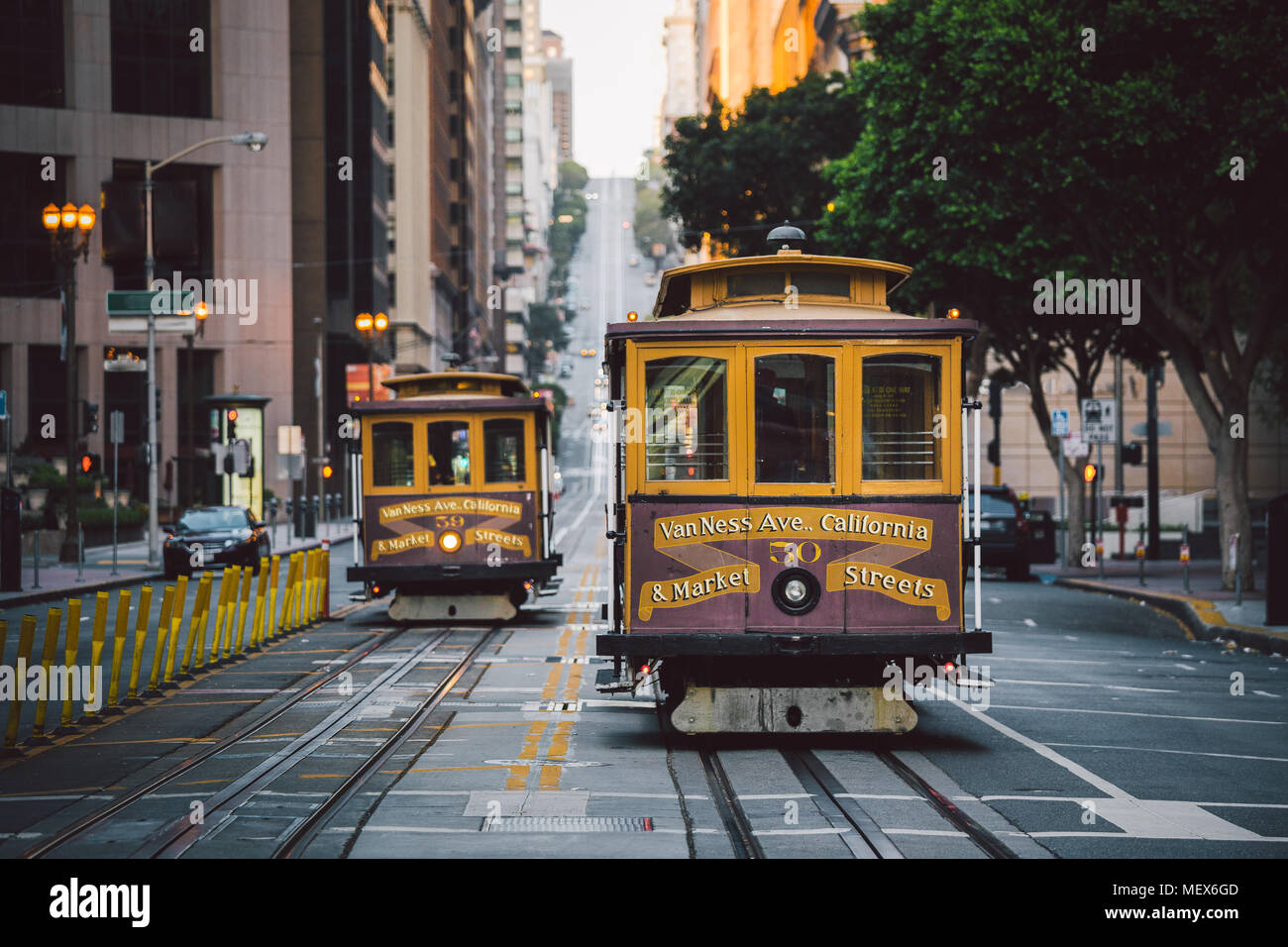 Classic panorama view of historic San Francisco Cable Cars on famous California Street at sunset with retro vintage Instagram style VSCO filter effect Stock Photo