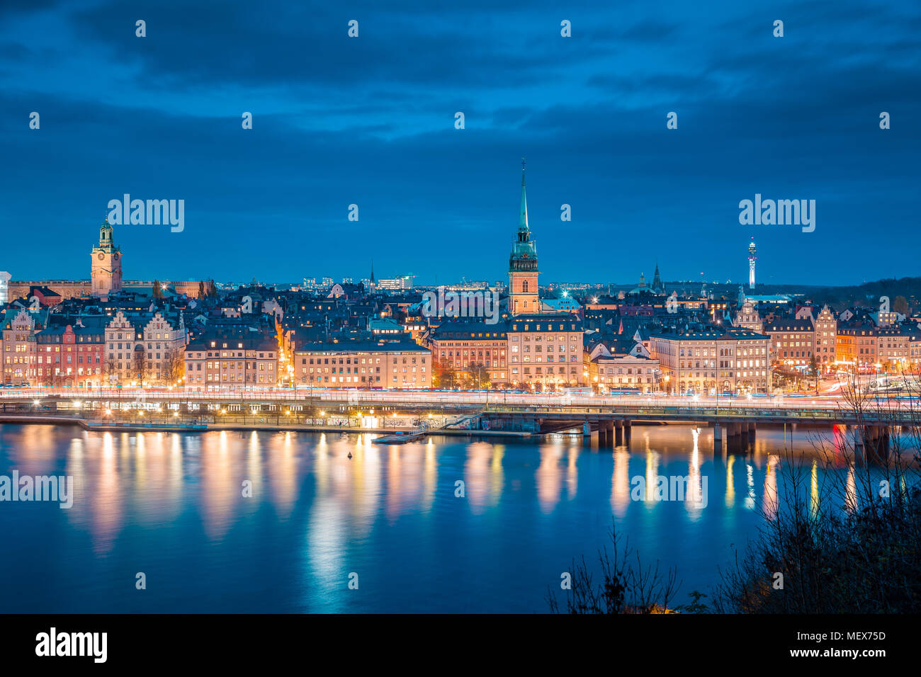 Panoramic view of famous Stockholm city center with historic Gamla Stan old town district during blue hour at dusk, Sodermalm, Stockholm, Sweden Stock Photo