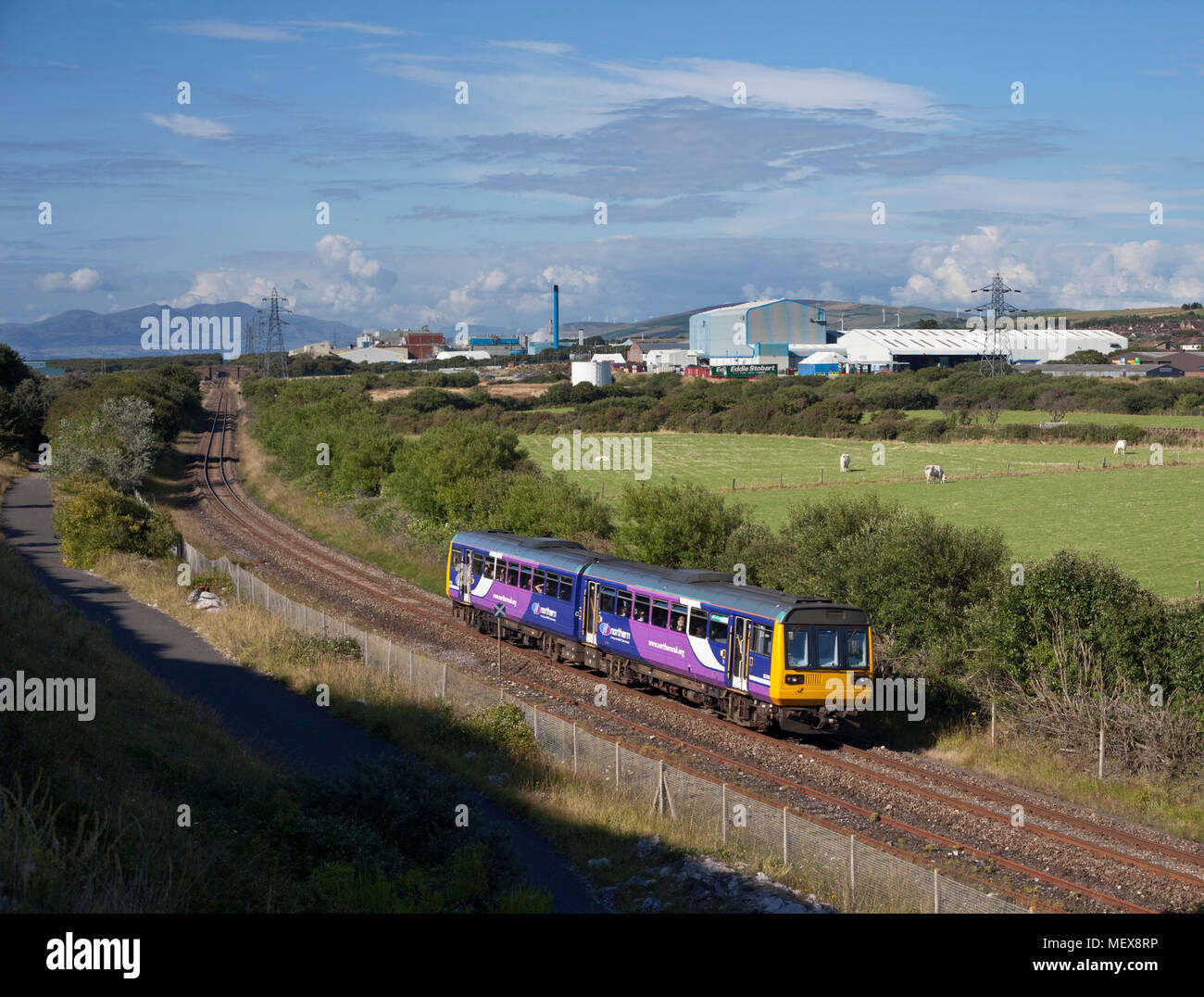 A Northern rail class 142 pacer train at  Ormsgill (Barrow in Furness) on the Cumbrian coast railway line Stock Photo