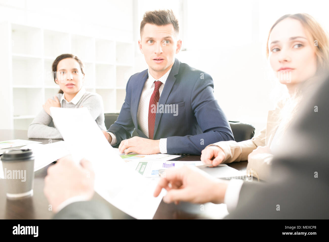 Business employees listening to boss Stock Photo