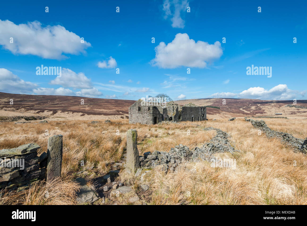 A derelict abandoned and Edwardian farmhouse on the moorland of Calderdale in West Yorkshire Stock Photo