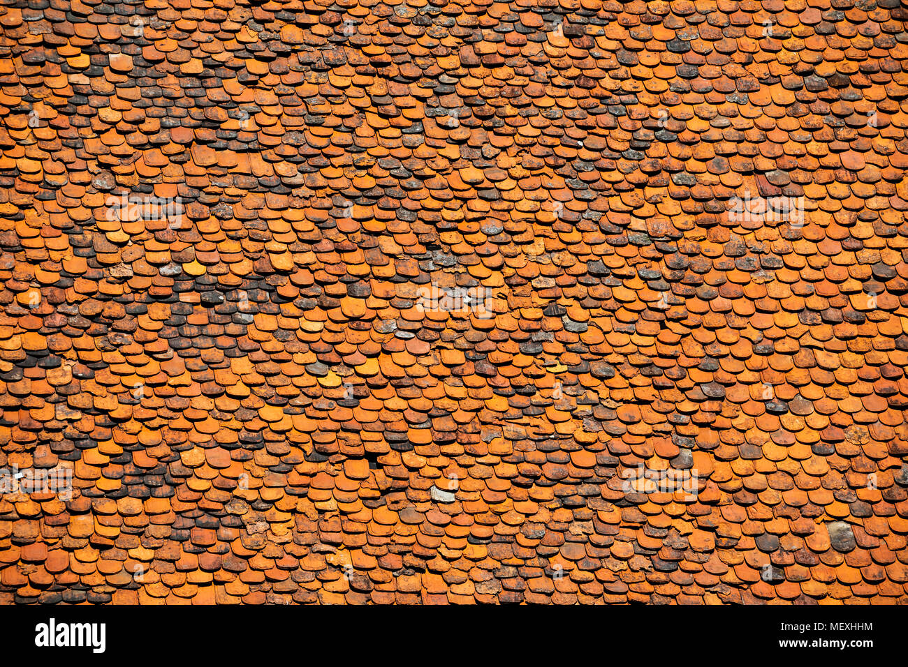 housetop with historic beaver-tail roofing tiles in Büdingen, Hesse, Germany, Europe Stock Photo