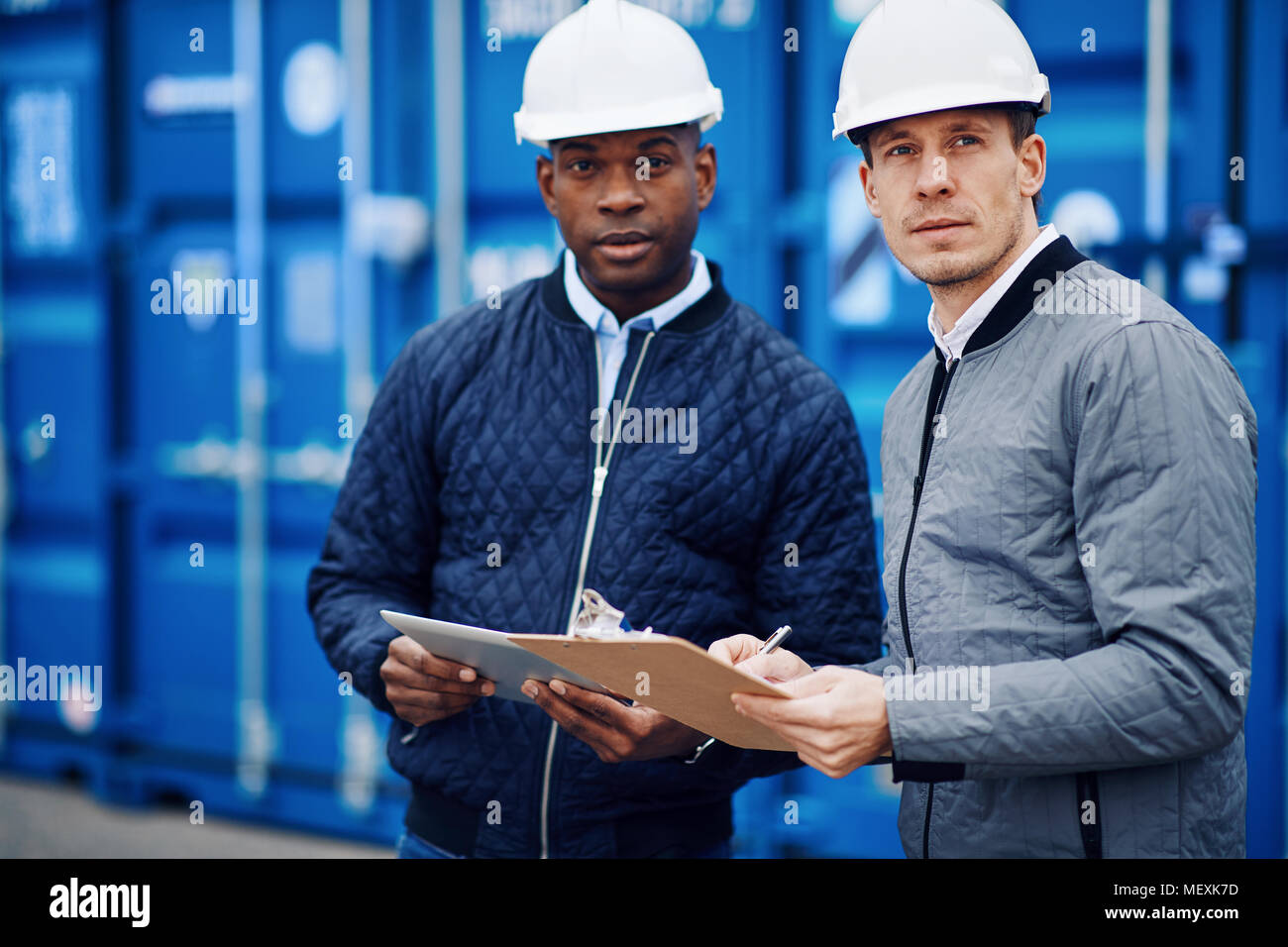 Two engineers tracking inventory hi-res stock photography and images ...
