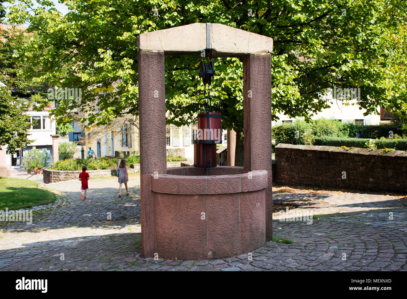Classic dug water well at garden outdoor for german people and foreigner travelers visit and travel at Ladenburg town on August 28, 2017 in Baden-wurt Stock Photo