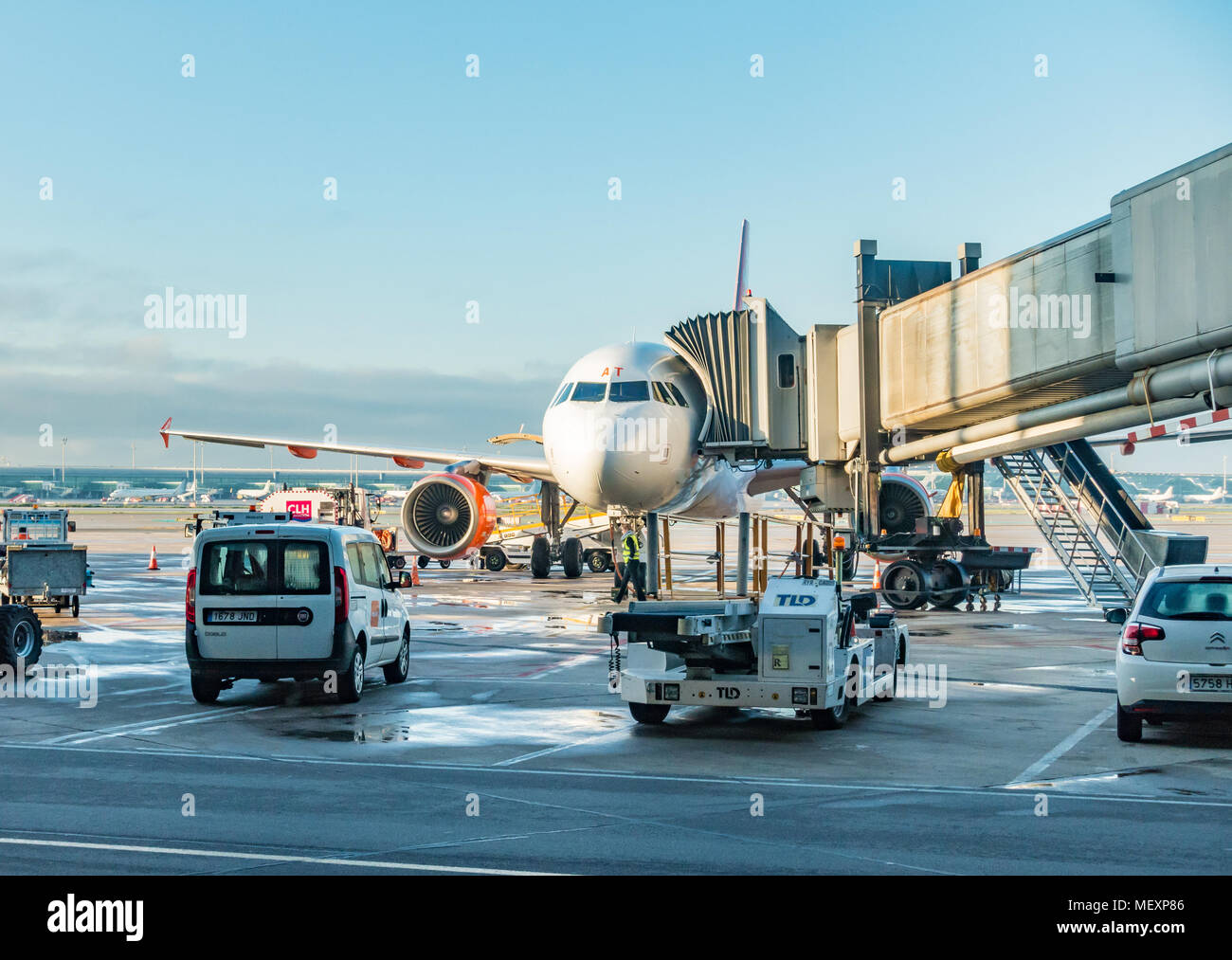 An easyJet aircraft at a gate at Barcelona airport Stock Photo - Alamy