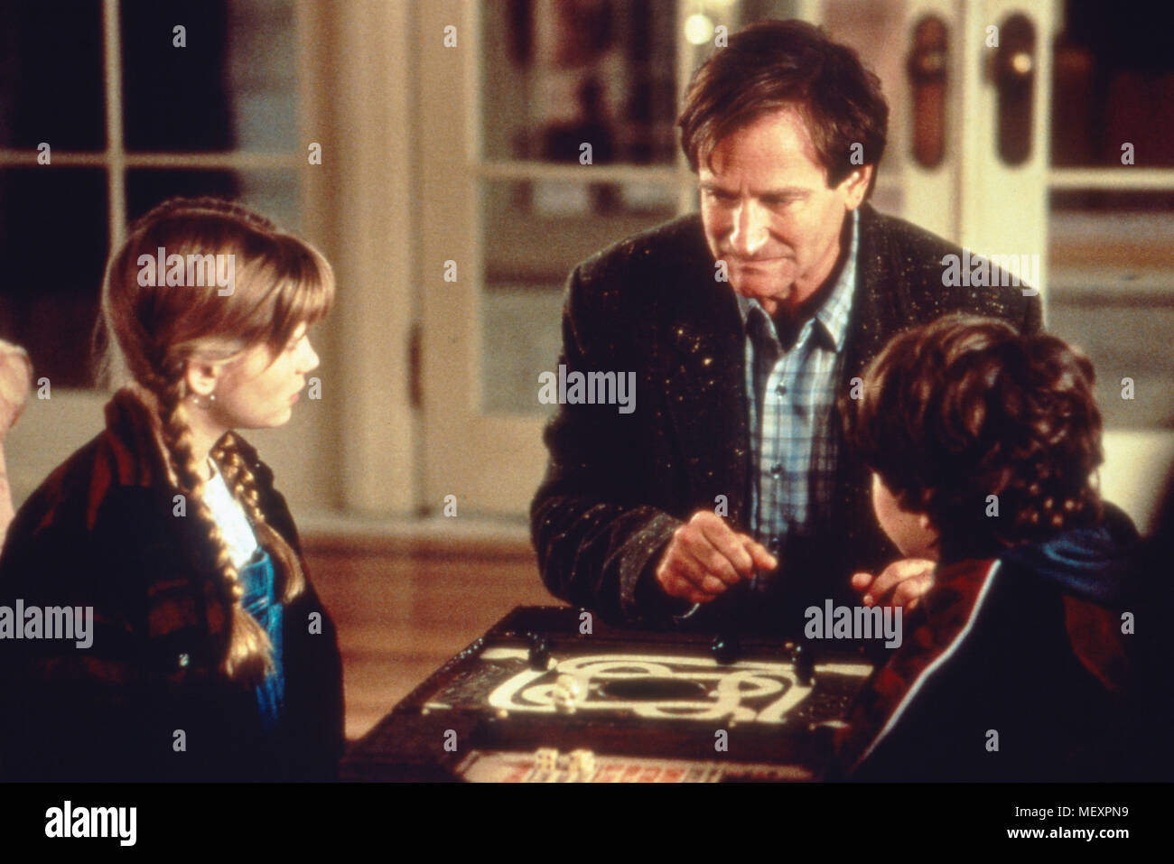 Jumanji, USA 1995 Regie: Joe Johnston Darsteller: Robin Williams, Kirsten Dunst, Adam Hann-Byrd Stock Photo