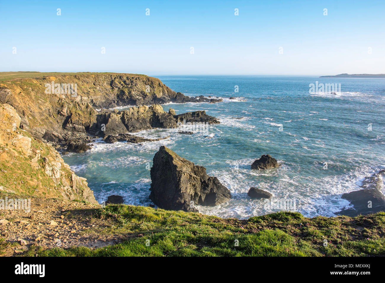 Scenic landscape of Pembrokeshire coast,South Wales,Uk.Seaview from cliff edge,blue sky and good weather.Blue lagoon,British coast scenery,Nature uk. Stock Photo