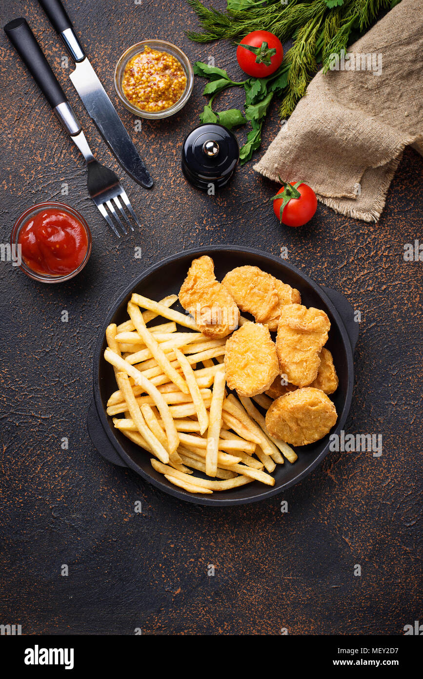 French fries and chicken nuggets Stock Photo Alamy
