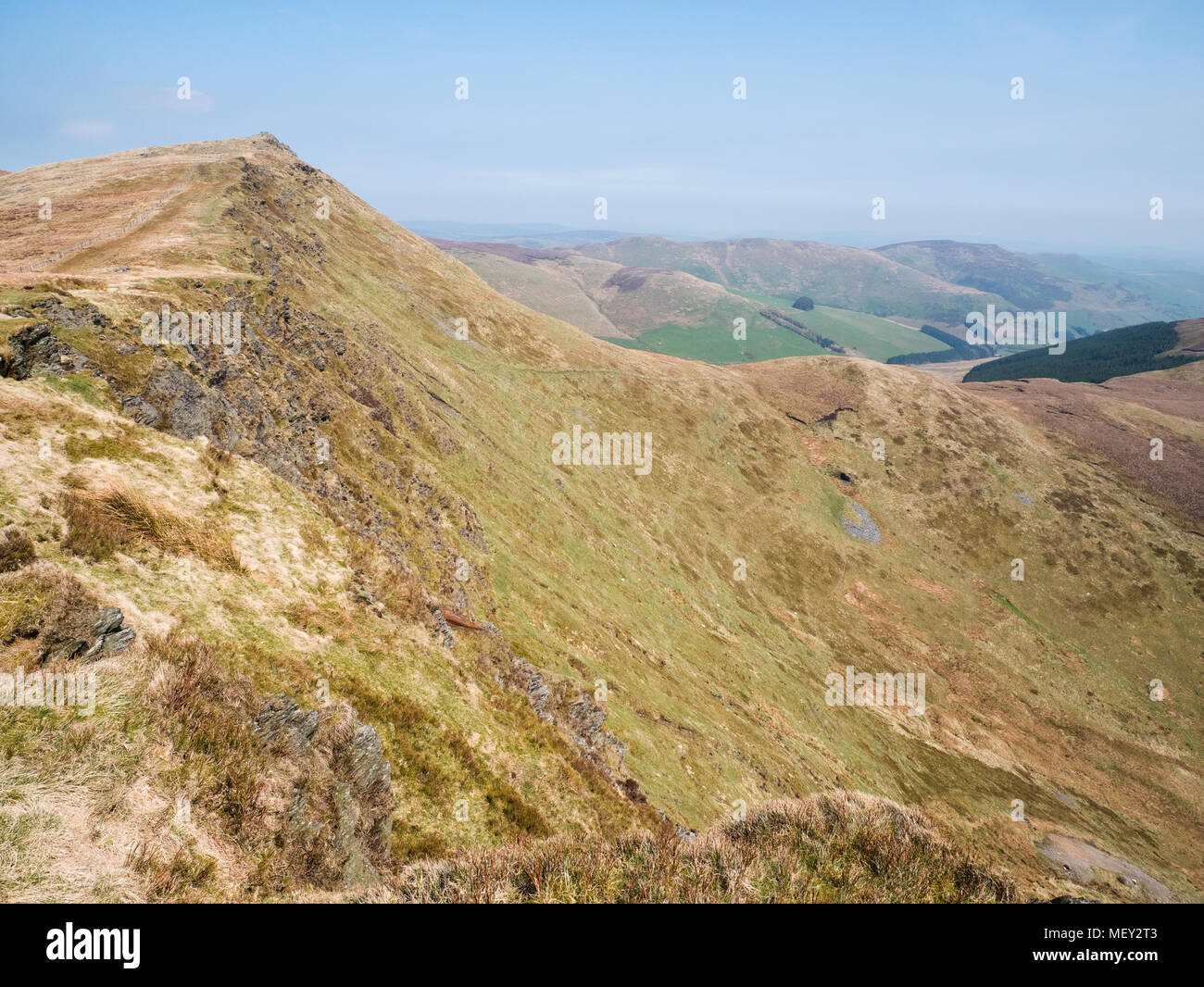 View past the summit of Cadair Berwyn, over Moel yr Ewig into Cwm Maen Gwynedd Stock Photo