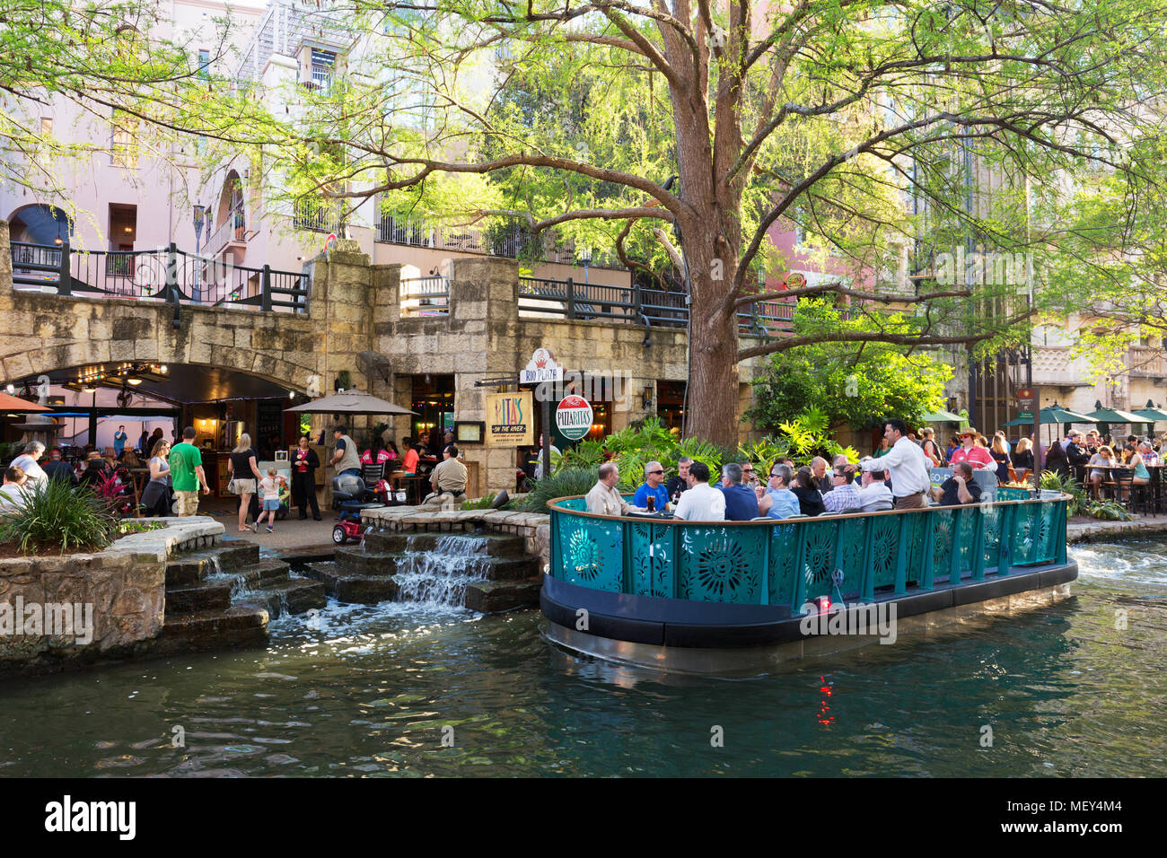 Tourists enjoying a boat trip, San Antonio River Walk, San Antonio, Texas USA Stock Photo